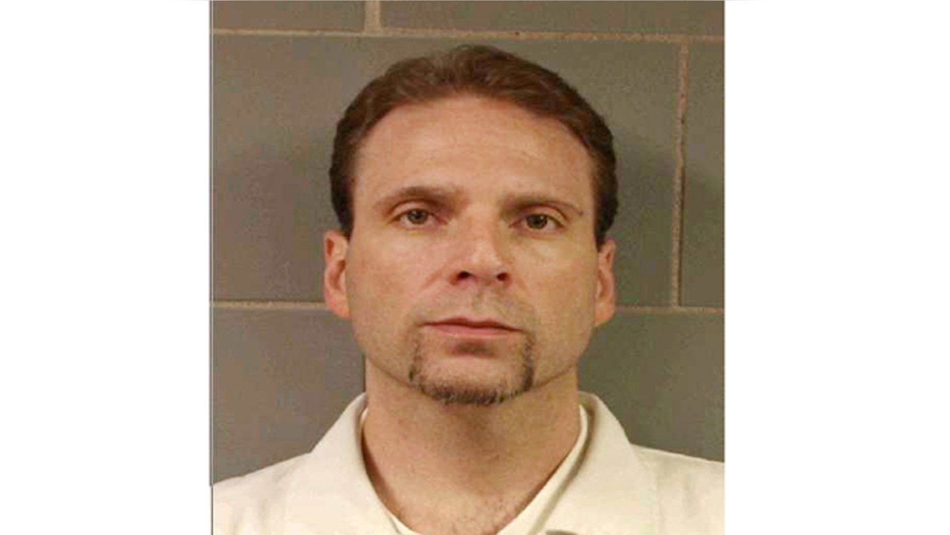 This undated file photo provided by the FBI shows Kenneth Conley, one of two inmates who escaped from the Metropolitan Correctional Center in downtown Chicago on Dec. 18, 2012.