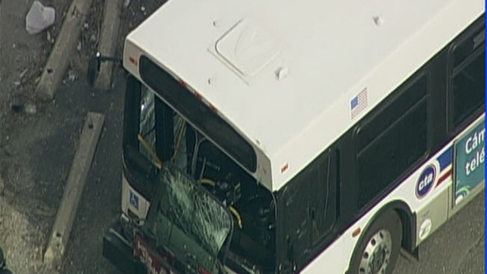 Police and emergency teams respond to a CTA bus accident possibly near the site of a shooting in Chicago.