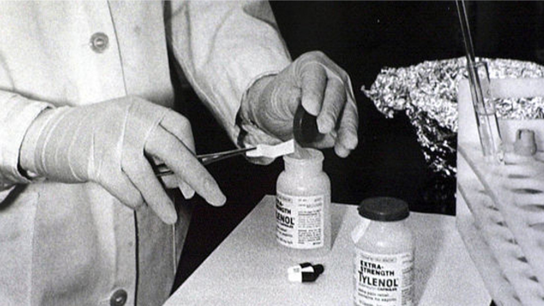 FILE: October 1982: Bottles of Extra-Strength Tylenol are tested with a chemically treated paper that turns blue in the presence of cyanide at the Illinois Department of Health in Chicago.