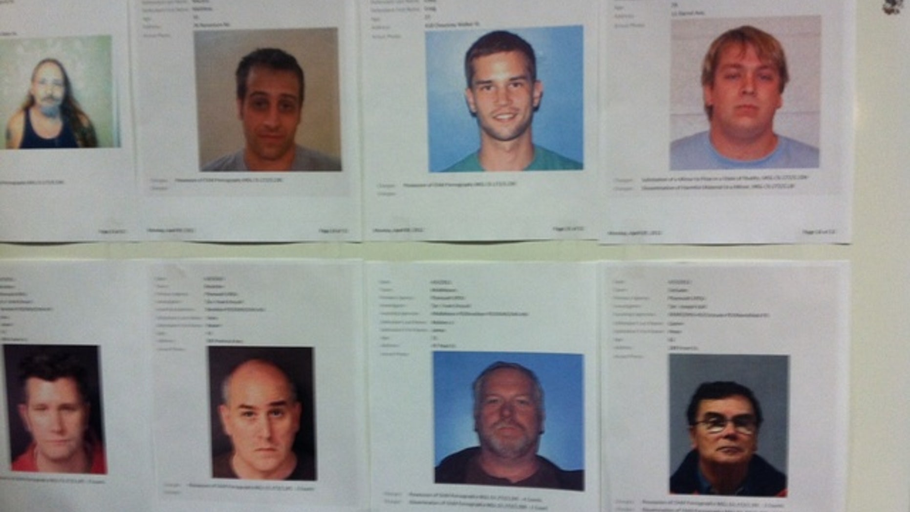 April 10, 2012: Mugshots of those arrested were posted on the walls of Massachusetts State Police Headquarters in Framingham.