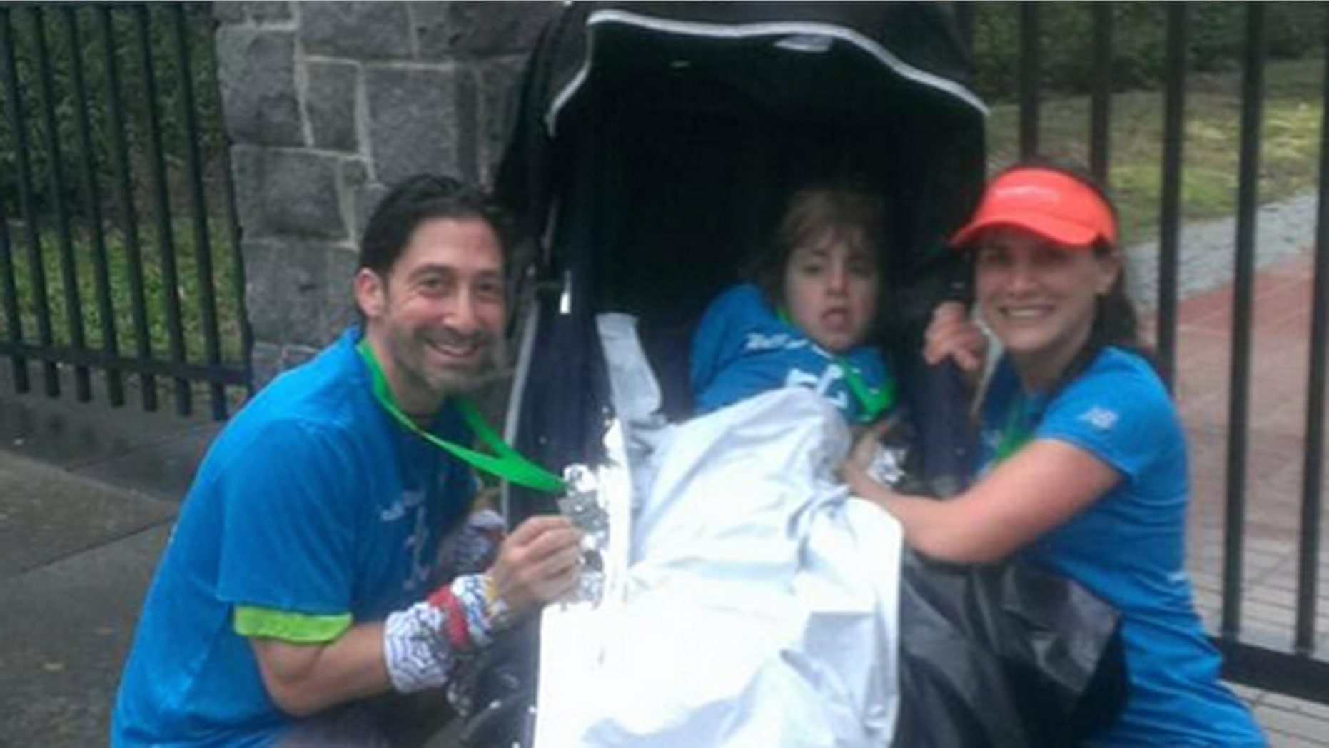 Marjan Holbrook and her daughter Rebecca got a helping hand from nurse Gary Harris.