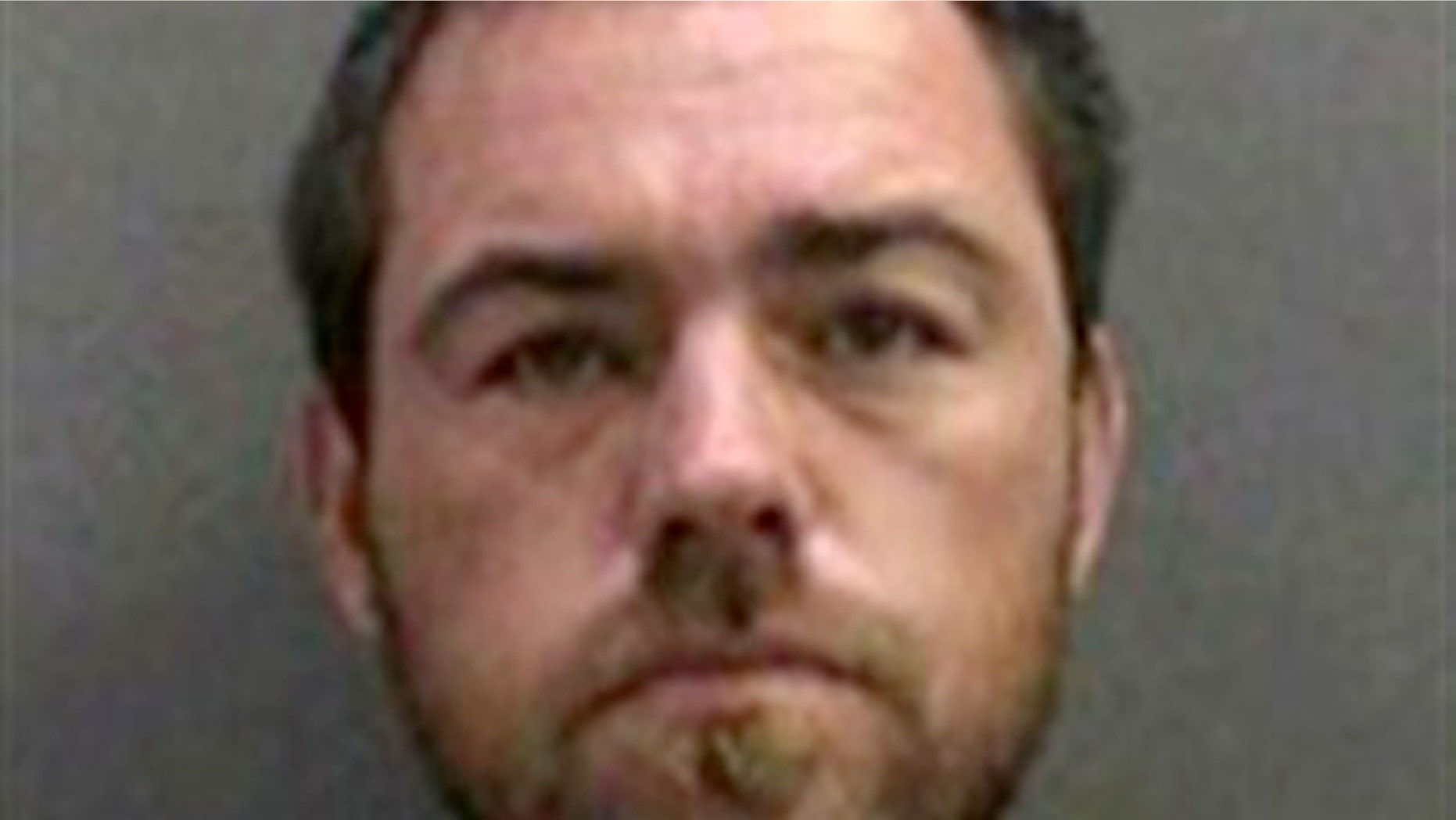 In this booking photo released by the Orange County Sheriff's Dept. on Monday Aug. 29, 2011 showing Sloan Briles, 35 who was arrested Sunday Aug. 28, 2011 for investigation of child endangerment and resisting arrest. Sloan was arrested for allegedly throwing his 7-year-old son overboard a Southern California sightseeing cruise during an argument.