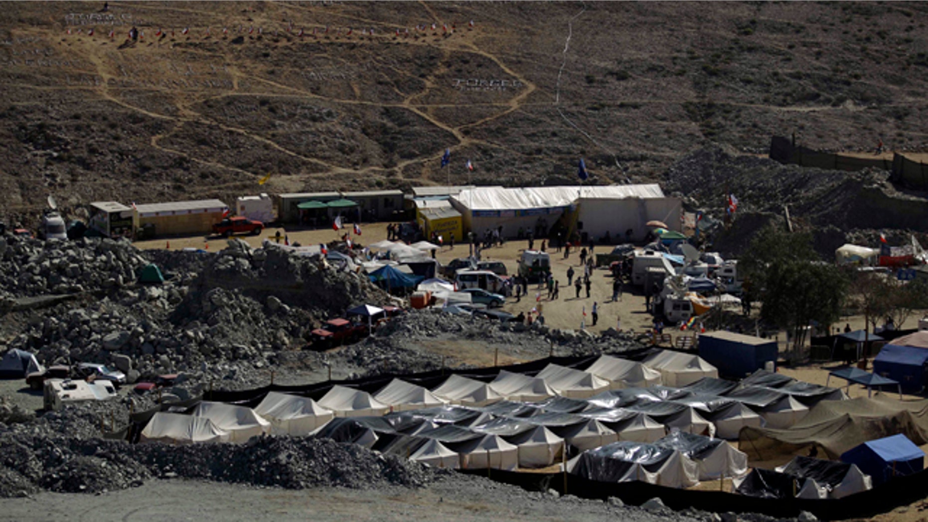 The camp where relatives of 33 trapped miners wait for news is seen outside the San Jose mine in Copiapo, Chile, Wednesday, Aug. 25, 2010.