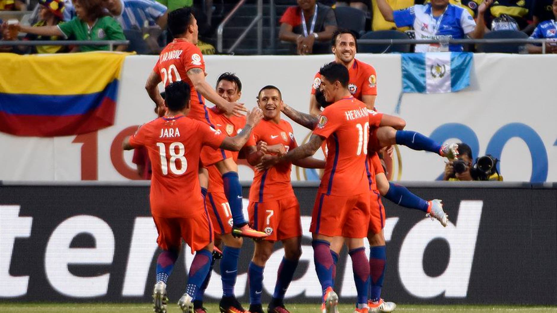 CHICAGO, ILLINOIS - JUNE 22: Jose Pedro Fuenzalida #6 of Chile celebrates with his teamamates after scoring his team's second goal during a Semifinal match between Colombia and Chile at Soldier Field as part of Copa America Centenario US 2016 on June 22, 2016 in Chicago, Illinois, US. (Photo by David Banks/LatinContent/Getty Images)