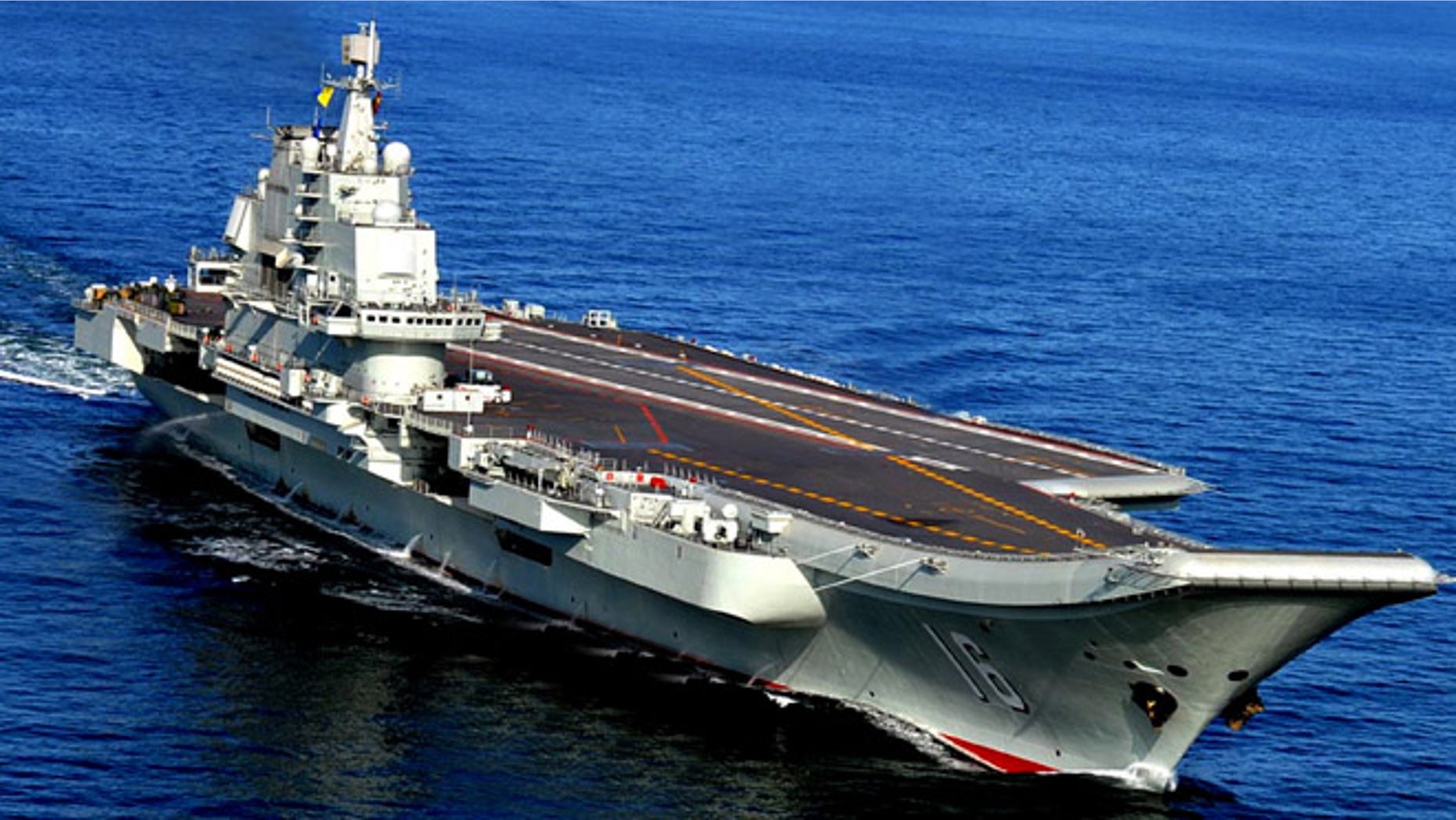 In this Oct. 14, 2012 photo, the Liaoning, China's first aircraft carrier, sails in the sea near Qingdao in eastern China's Shandong province. (AP/Chinatopix)