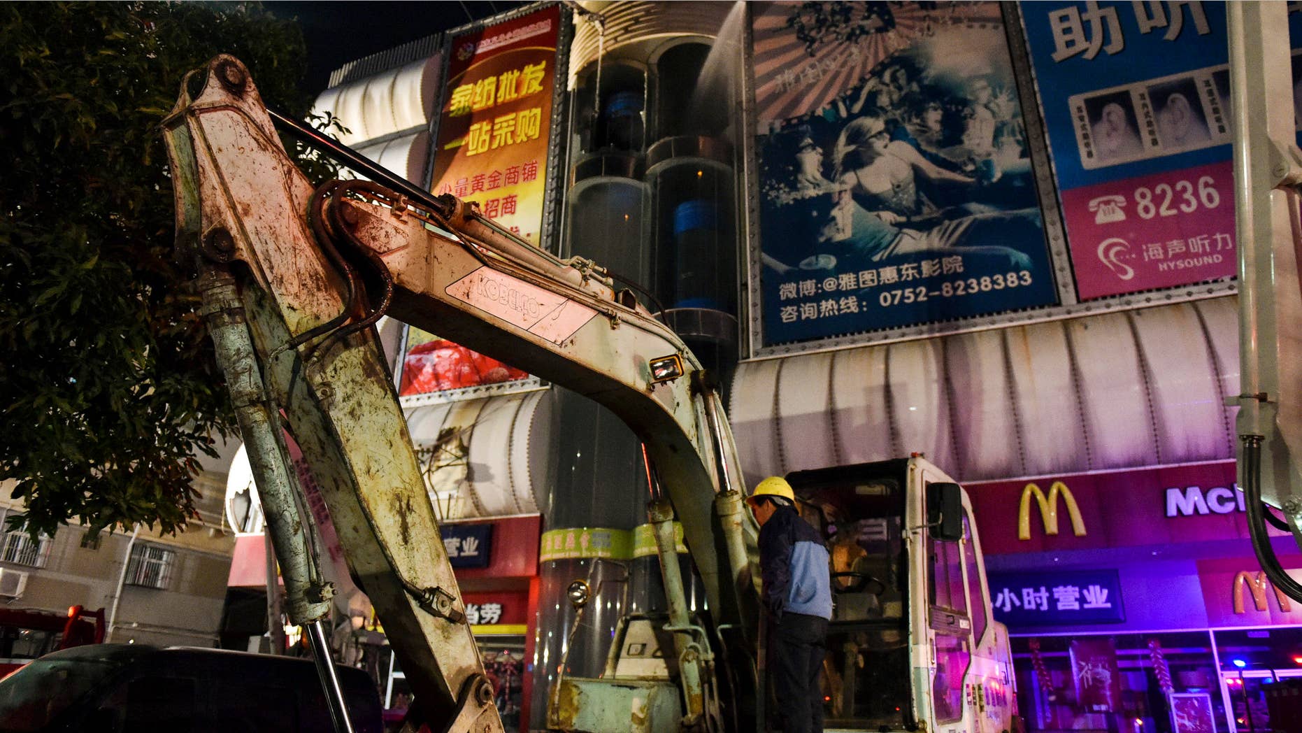 Feb. 6, 2015: China's Xinhua News Agency, fire fighters try to extinguish a fire at a wholesale market in Huidong County, southern Guangdong province.