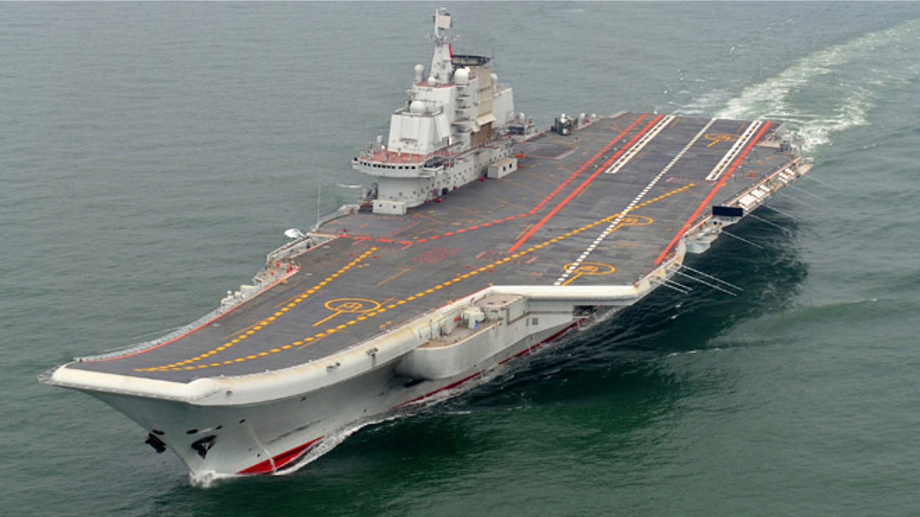 FILE: Chinese aircraft carrier Liaoning cruises for a test on the sea.
