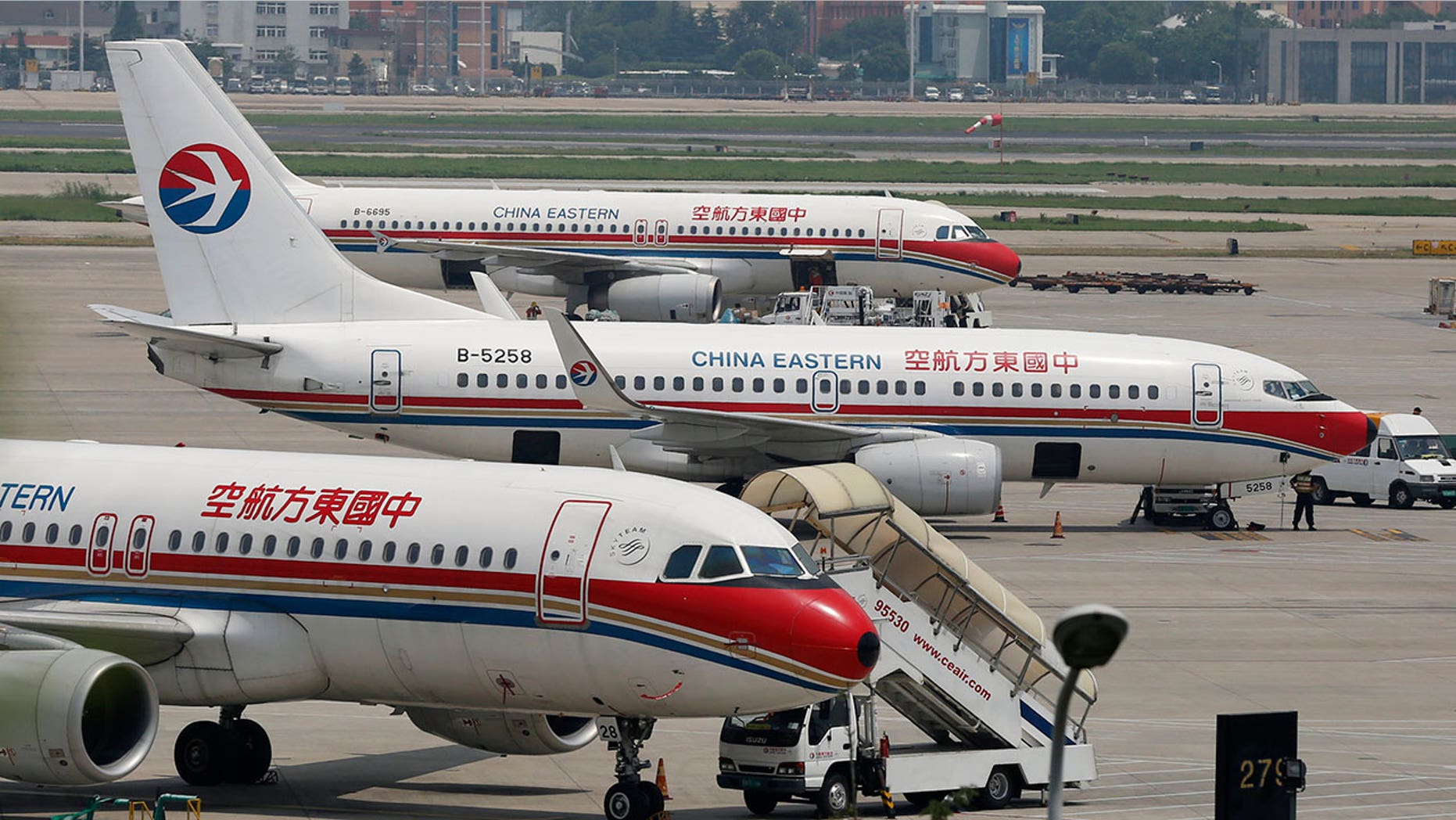 Passengers suffered cuts, bruises and fractures following a turbulent flight aboard China Eastern Airlines.