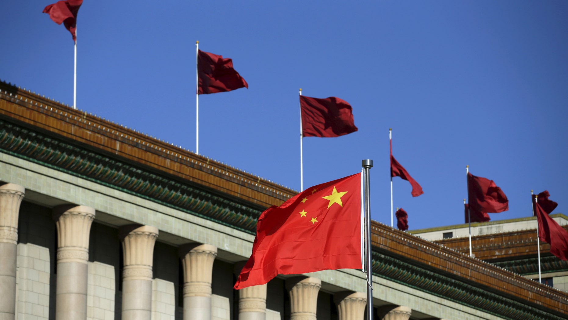 File photo - Chinese flag waves in front of the Great Hall of the People in Beijing, China, Oct. 29, 2015. (REUTERS/Jason Lee)