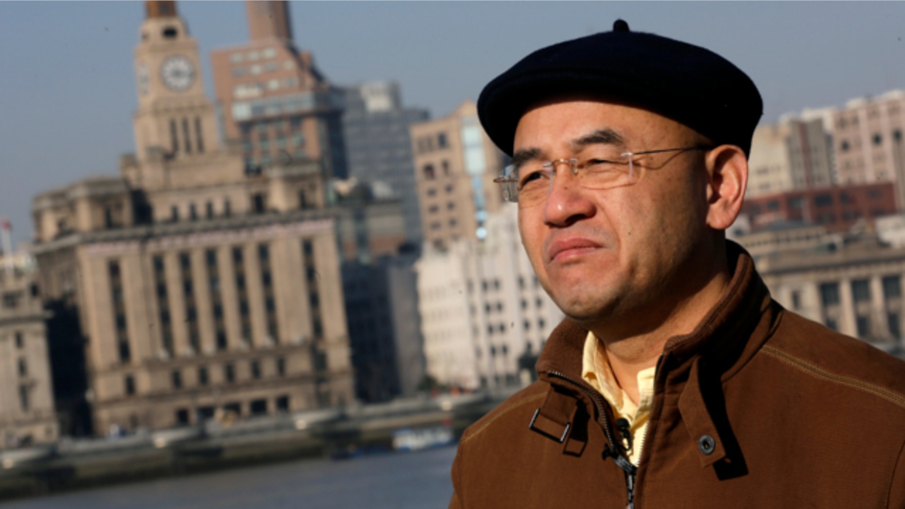 Jan. 28, 2013: Chinese-born U.S. scientist Hu Zhicheng stands at the waterfront promenade along the Huangpu River in Shanghai, China.