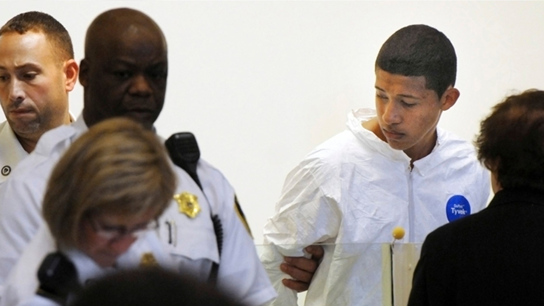 FILE 2013: Philip Chism, 14, stands during his arraignment for the death of Danvers High School teacher Colleen Ritzer in Salem District Court in Boston.