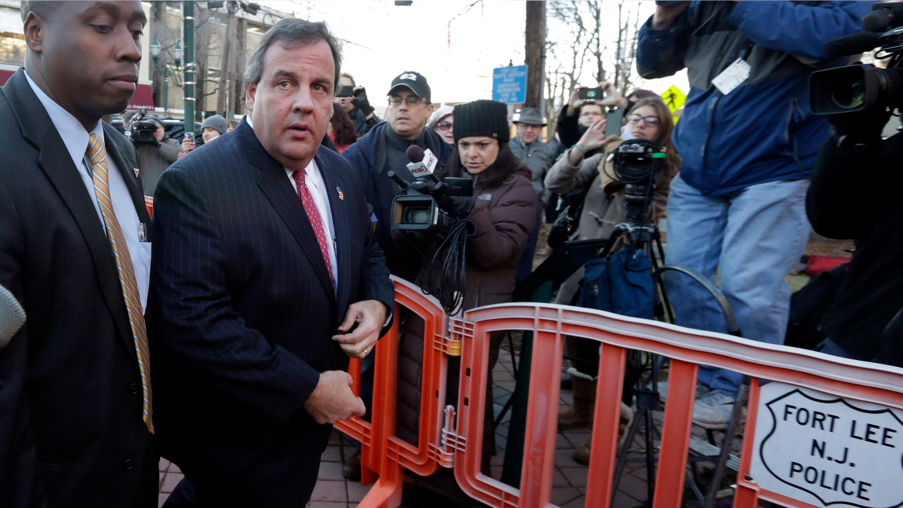 New Jersey Gov. Chris Christie arrives at Fort Lee, N.J., on Jan. 9, 2014.