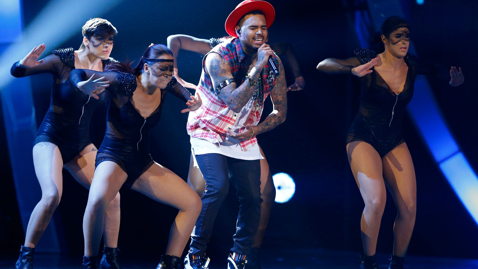 Chris Brown performs at the15th Annual Latin Grammy Awards in Las Vegas, Nevada.