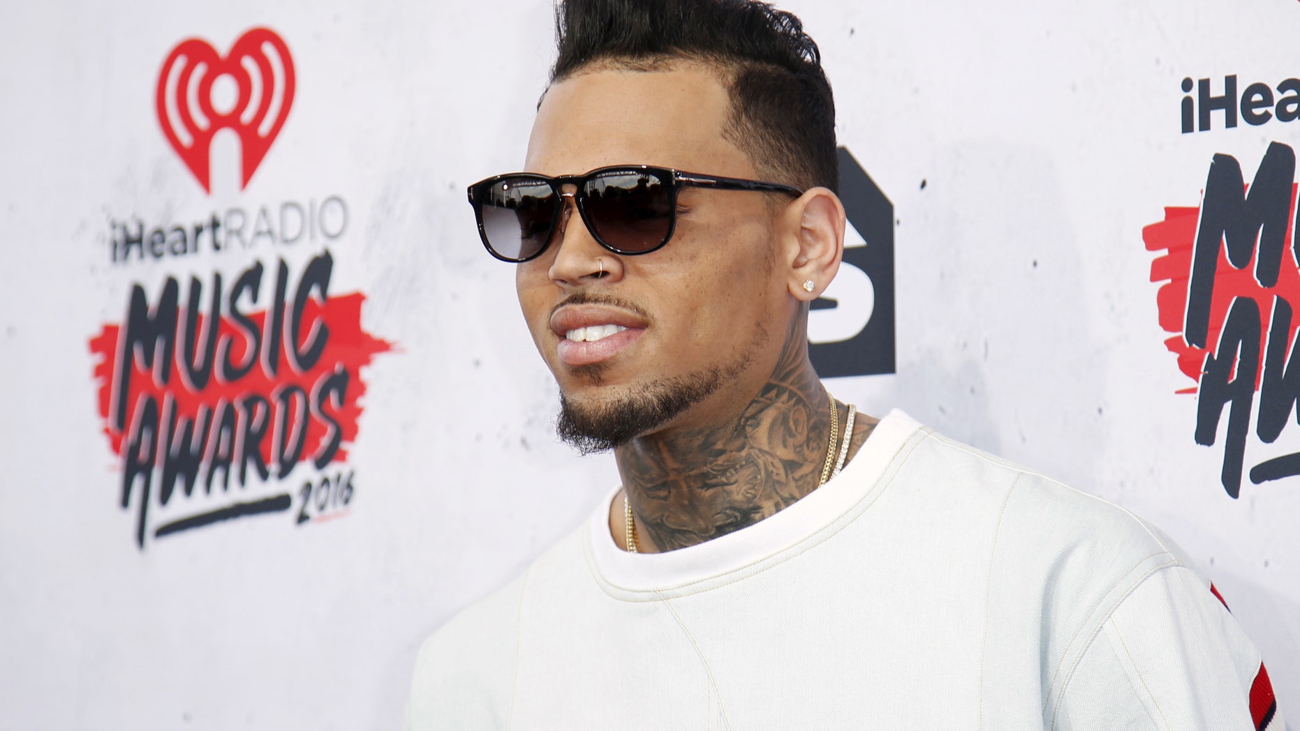 A lawyer for Chris Brown claims no drugs or guns were found at the singer's house.