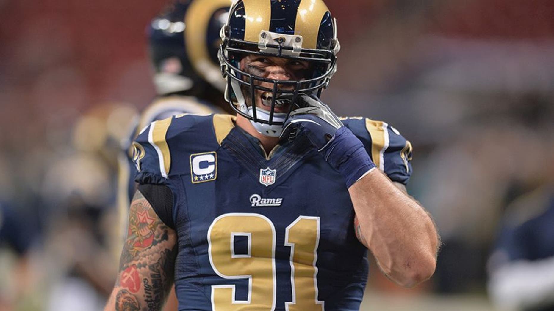 ST. LOUIS, MO - DECEMBER 11: Chris Long #91 of the St. Louis Rams warms up before a game against the Arizona Cardinals at the Edward Jones Dome on December 11, 2014 in St. Louis, Missouri. (Photo by Michael Thomas/Getty Images)