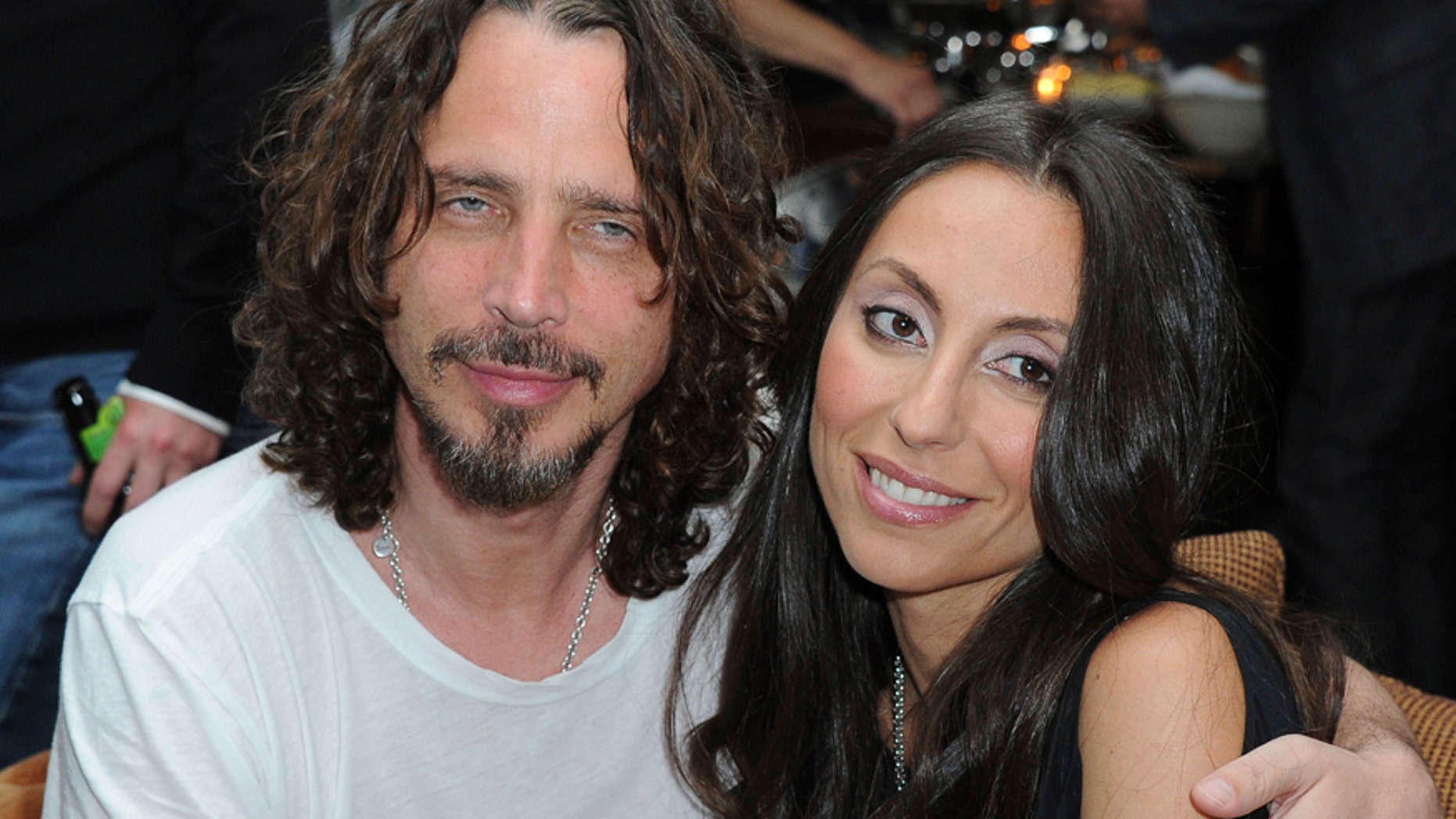 In this April 27, 2012, file photo, Chris Cornell, at left, and his wife, Vicky Karayiannis attend the celebration of "Commando: The Autobiography of Johnny Ramone," in Los Angeles.