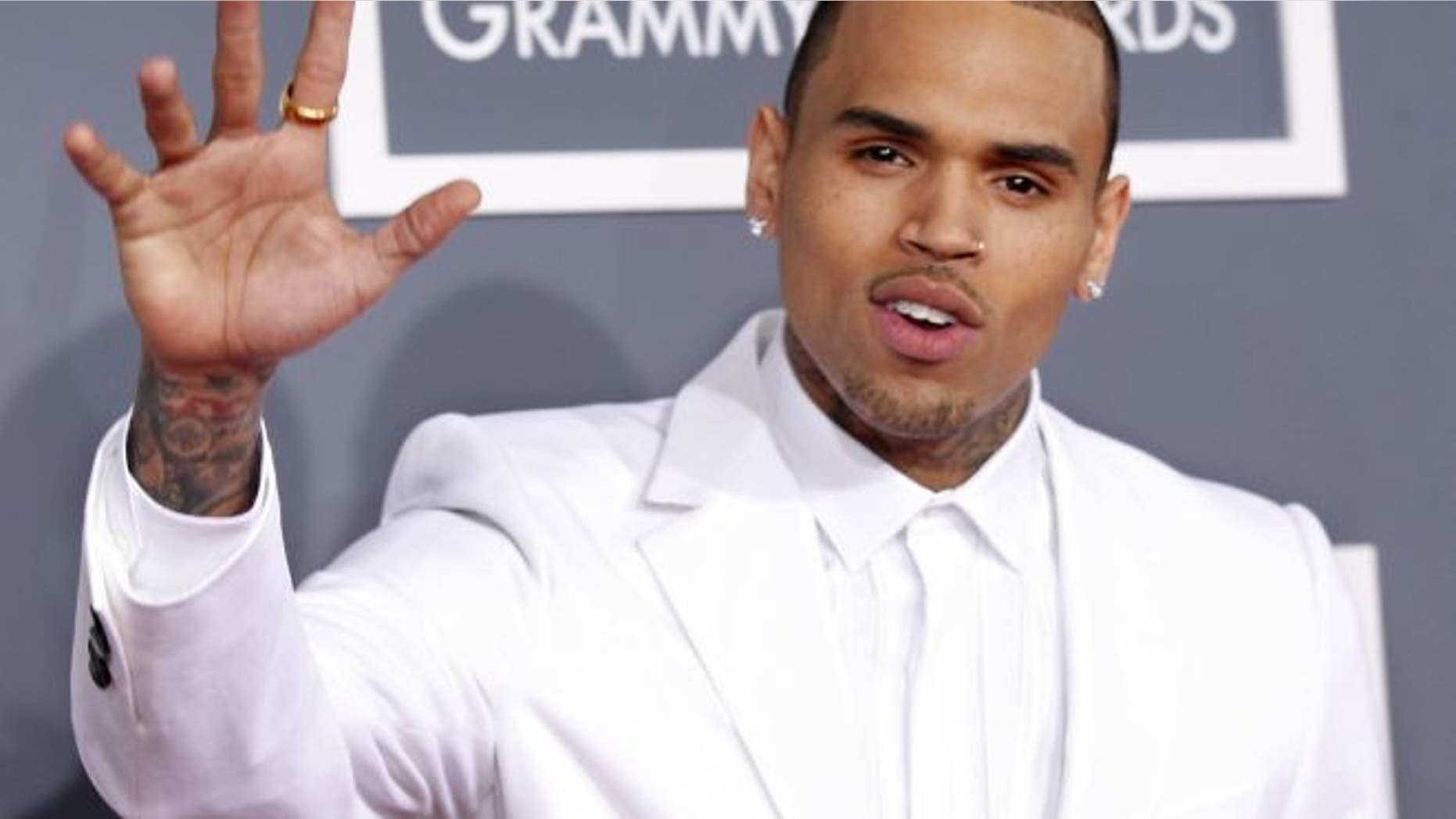 FILE: Feb. 10, 2013: Chris Brown arrives at the 55th annual Grammy Awards.
