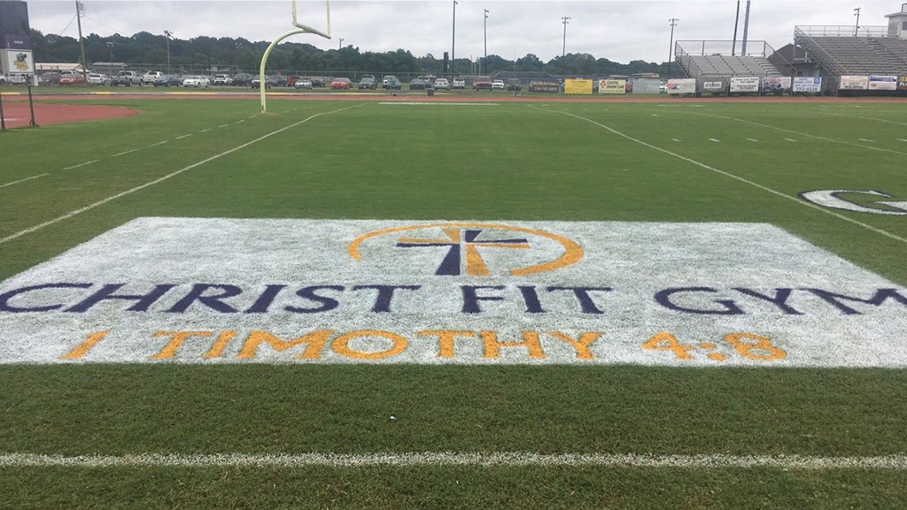 Two Benton High School students were ordered to remove a logo from the football field end zones because it included Christian references. The logo belonged to Christ Fit Gym, a faith-based gymnasium in nearby Bossier City, Louisiana. It included the words “Christ Fit Gym,” a cross and a Bible verse reference, 1 Timothy 4:8.