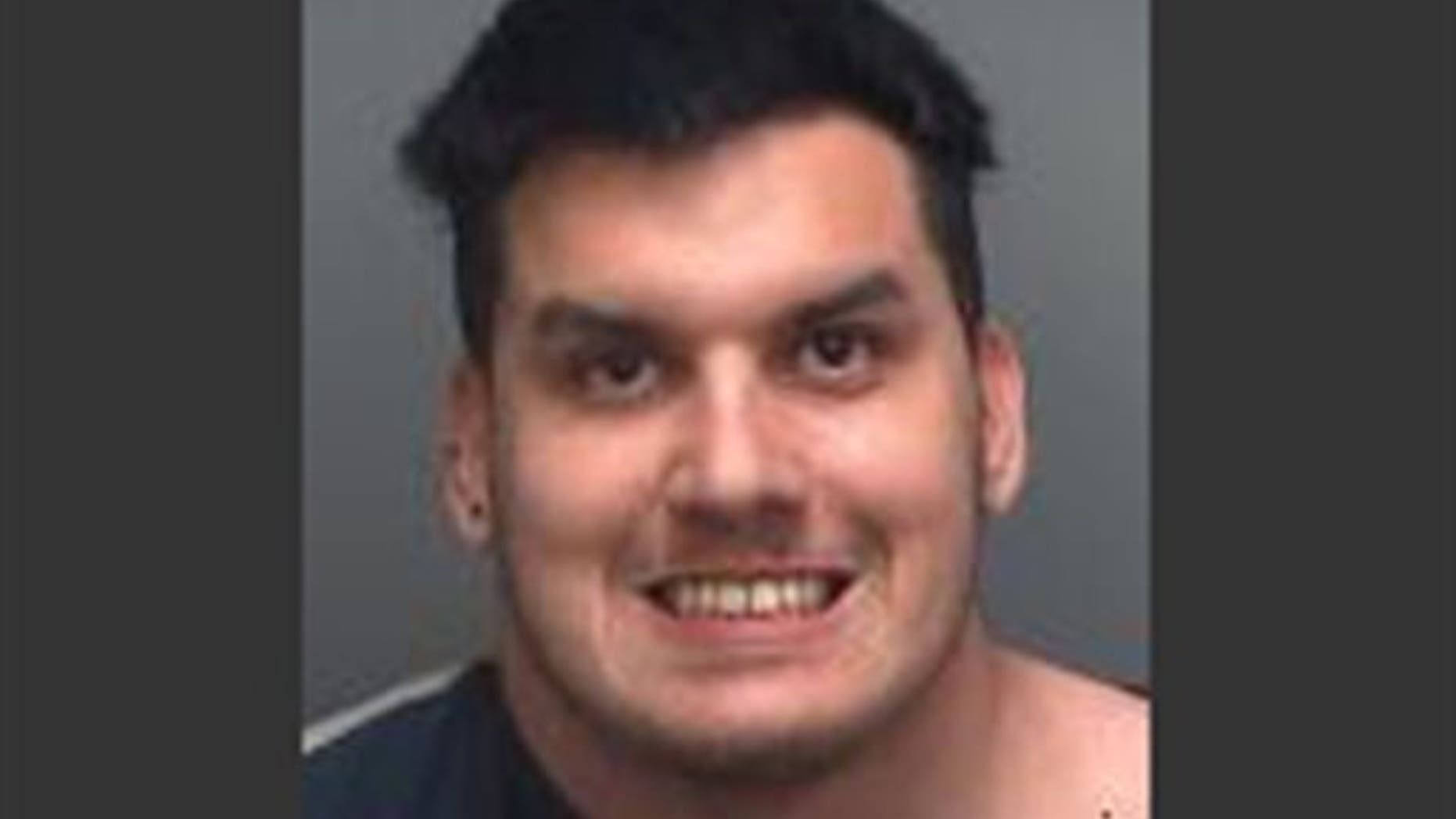 This undated photo provided by the Pinellas County Sheriff's office shows Christian Jose Gomez who was charged with first-degree murder after his mother was found decapitated outside their home on New Year's Eve. According to the Pinellas County Sheriff's Office, Mario Gomez called 911 on Wednesday, Dec. 31, 2014, and told dispatchers that his brother Christian had killed their mother and cut off her head. (AP Photo/Pinellas County Sheriff's Office)