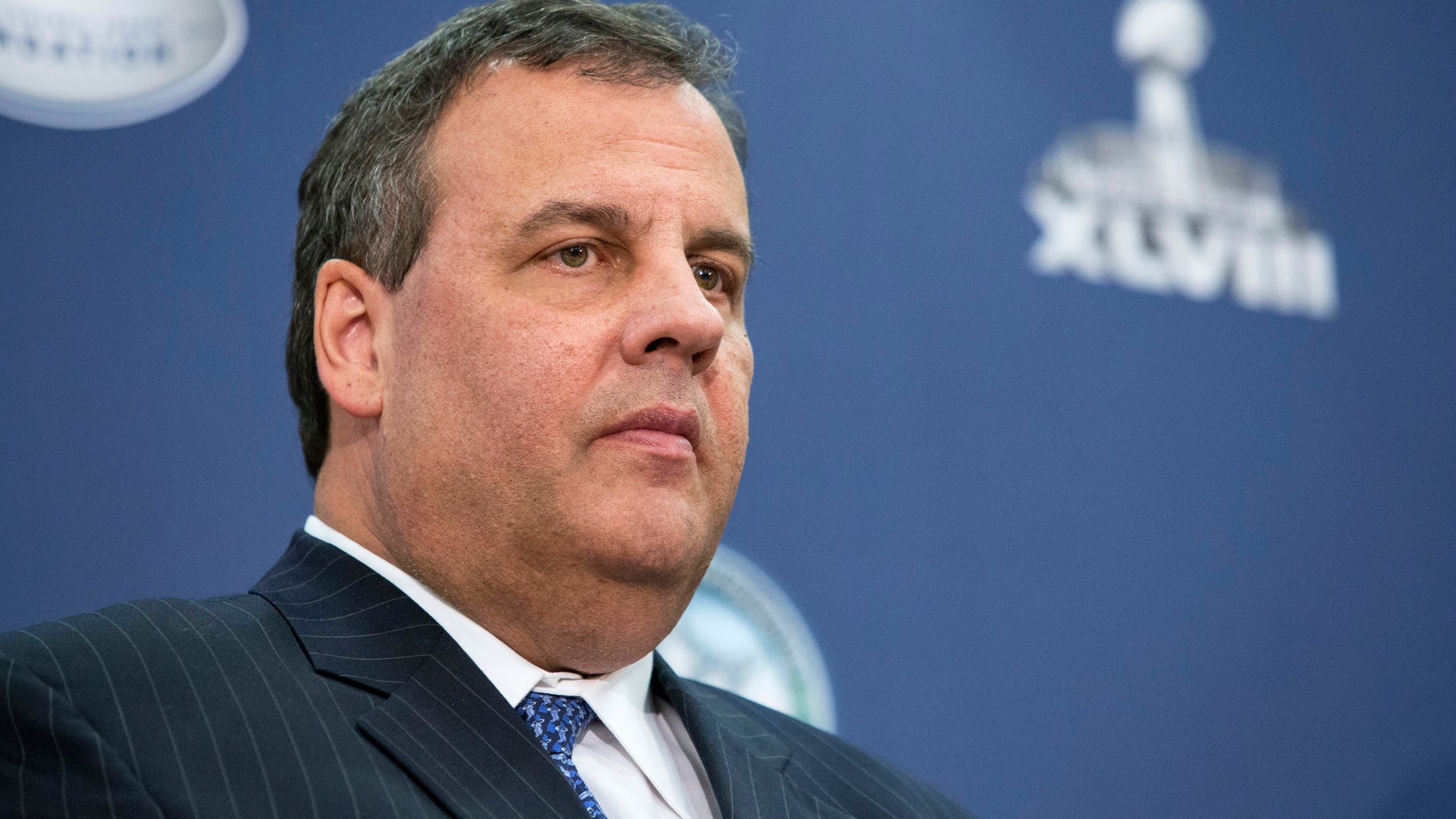 January 27, 2014. New Jersey Governor Chris Christie listens during a news conference at the Boys and Girls Club of Newark Clubhouse in Newark, New Jersey.