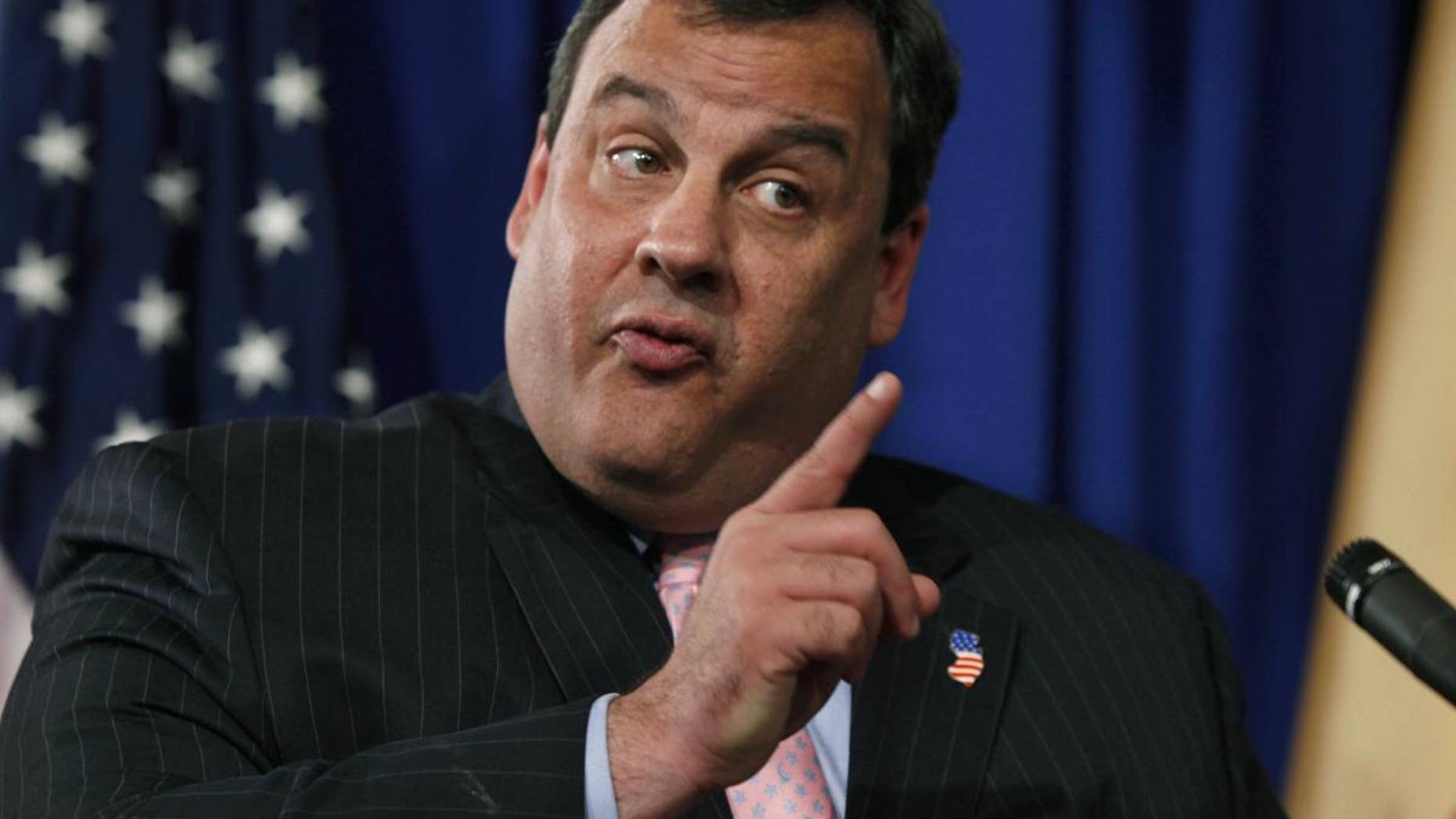 New Jersey Gov. Chris Christie addresses the media Thursday, May 26, 2011 in Trenton, N.J. on global warming. (AP Photo/Mel Evans)