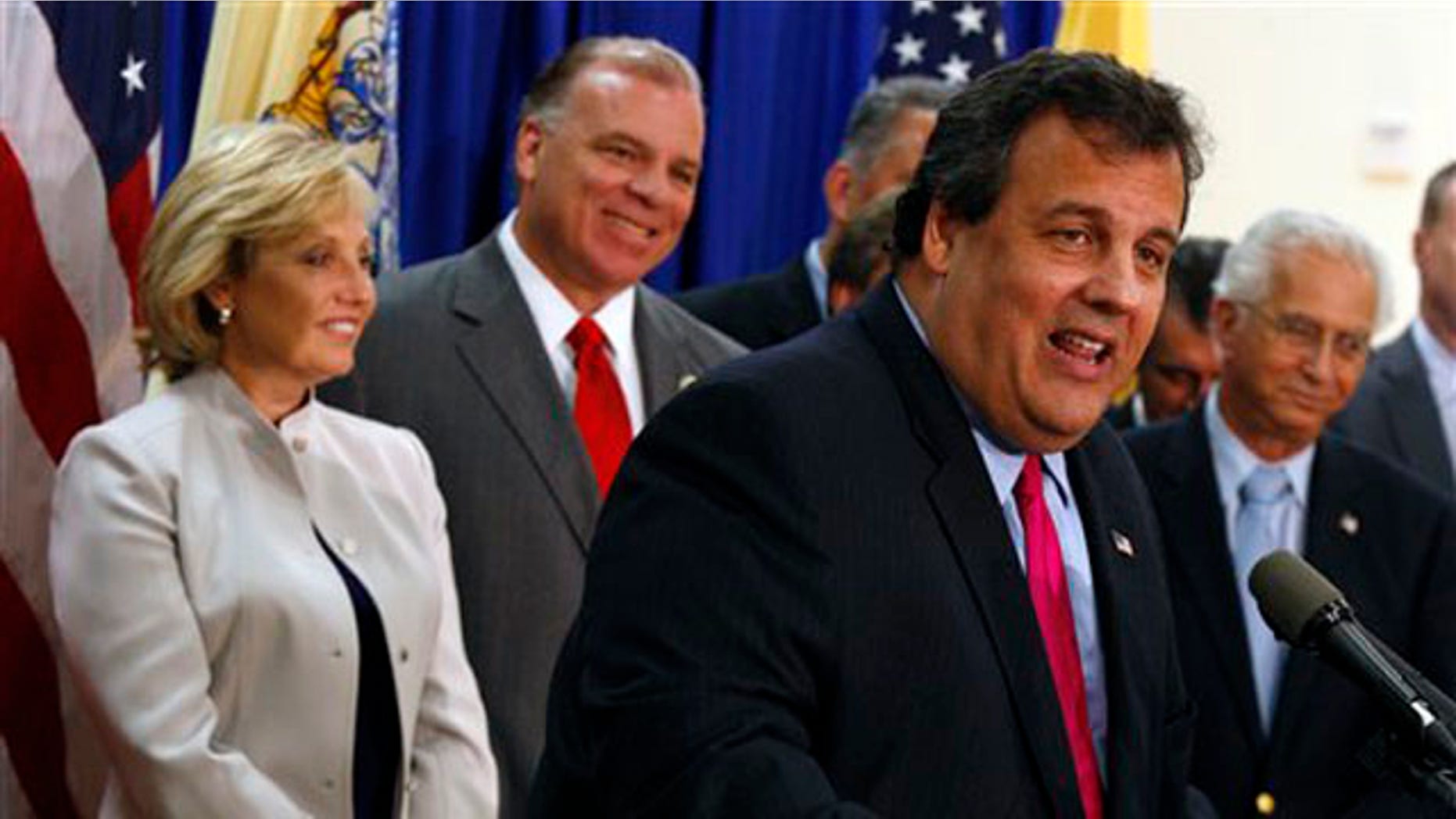 New Jersey Gov. Chris Christie answers a question after signing a property tax bill July 13 in Hamilton, N.J. (AP Photo)