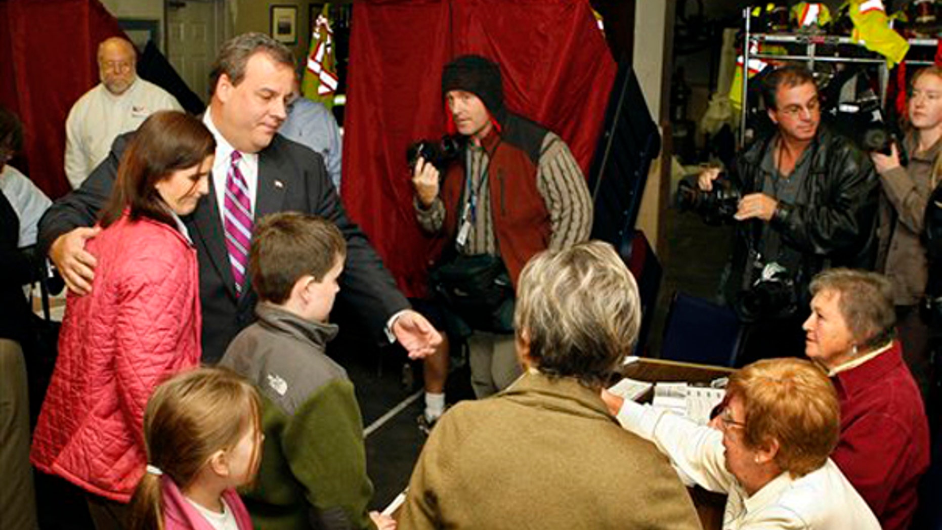 Tuesday: Chris Christie stands with wife Mary Pat Christie and children Bridgett and Patrick ahead of their voting in Mendham, N.J. (AP Photo)