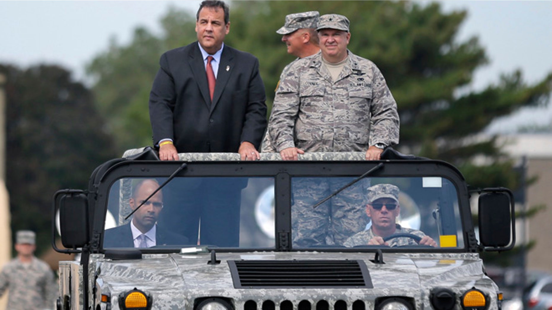 Sept. 28, 2014: New Jersey Gov. Chris Christie, left, and New Jersey Adjutant General Brig. Gen. Michael Cunniff, right, review troops during the New Jersey National Guard's annual Military Review in Sea Girt, N.J. (AP)