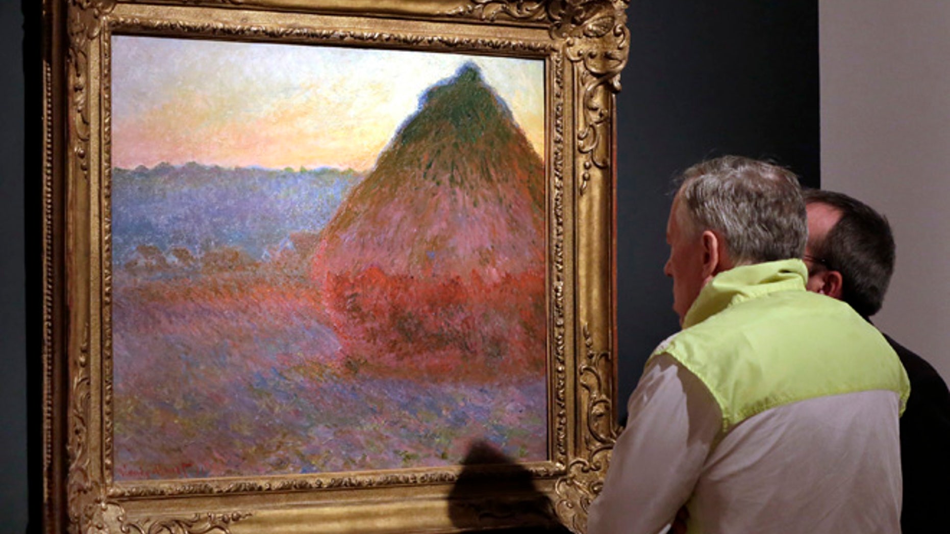 FILE - In this Nov. 4, 2016, file photo, Claude Monet's "Grainstack" is displayed at Christie's, in New York. The 1891 painting being offered Wednesday, Nov. 16, 2016, is one of a few still in private hands. (AP Photo/Richard Drew, File)