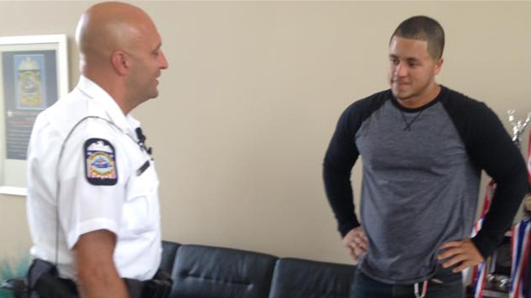 Officer James Poole and Christopher Jones. (Columbus Police Department)