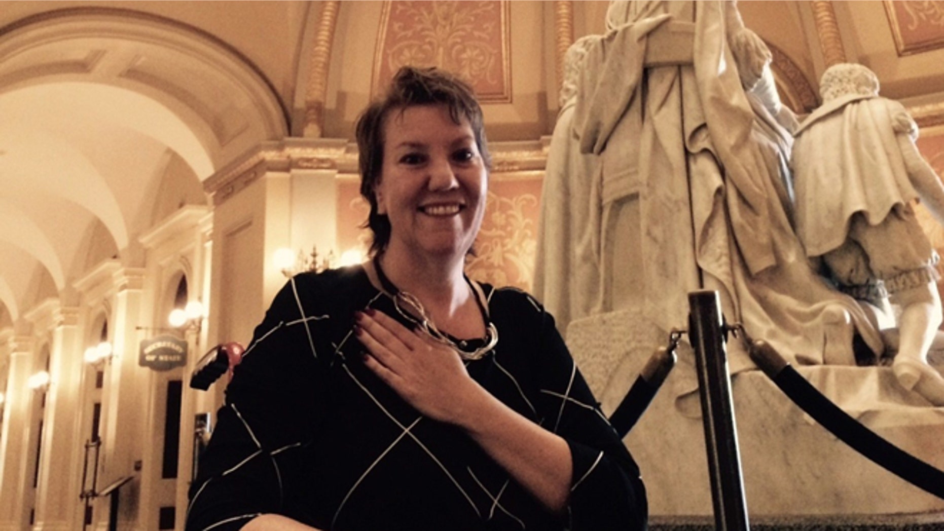 Sept. 11, 2015: Christy O'Donnell expresses joy at California State Capitol after state legislature passed End of Life Option Act.