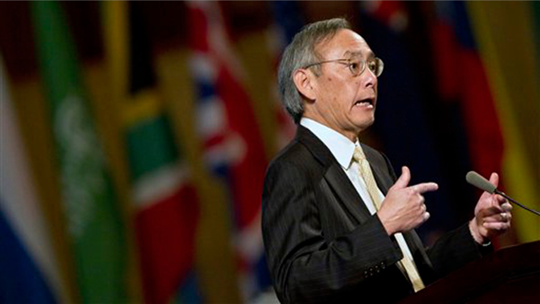 Secretary of Energy Steven Chu gestures as he delivering a keynotes address at a conference in Beijing, China, Sept. 22.