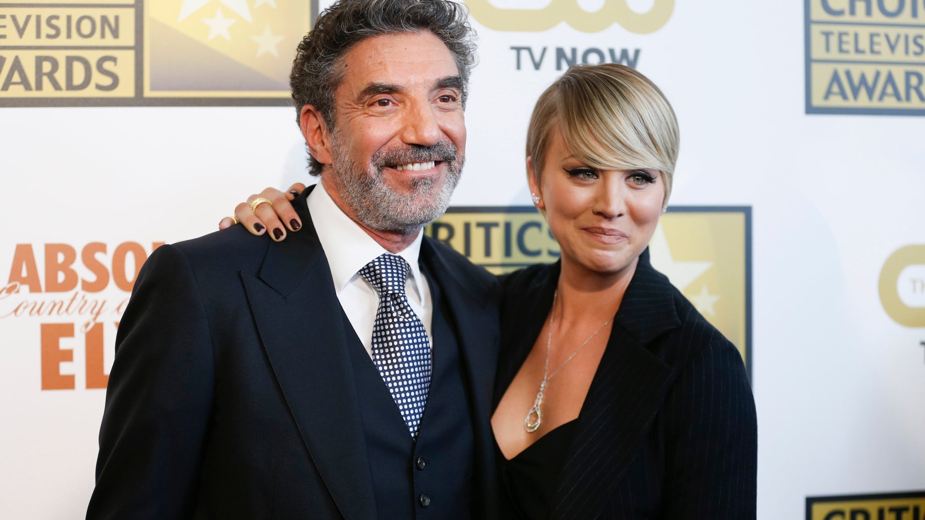 Producer and writer Chuck Lorre and actress Kaley Cuoco pose at the 4th annual Critics' Choice Television Awards in Beverly Hills, California June 19, 2014. REUTERS/Danny Moloshok (UNITED STATES - Tags: ENTERTAINMENT) - RTR3URHC