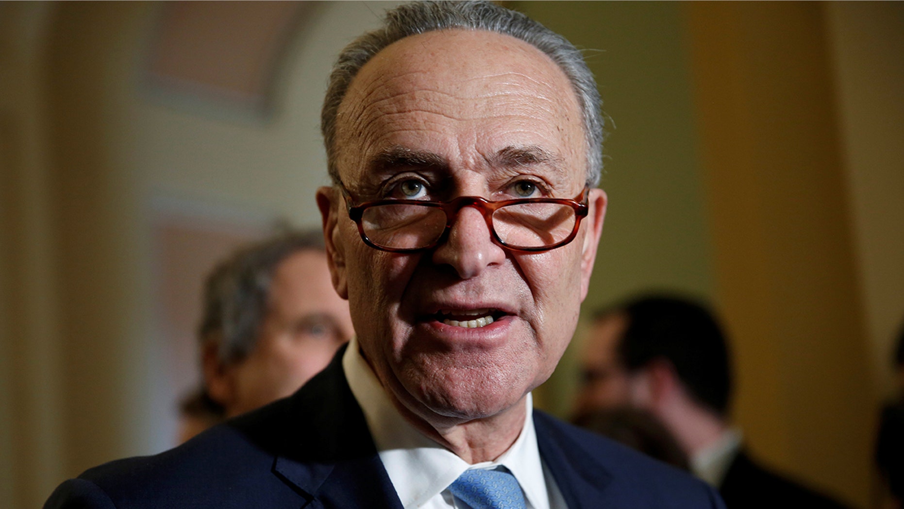 Senate Minority Leader Chuck Schumer (D-NY) speaks to reporters on Capitol Hill in Washington, U.S., January 30, 2018.
