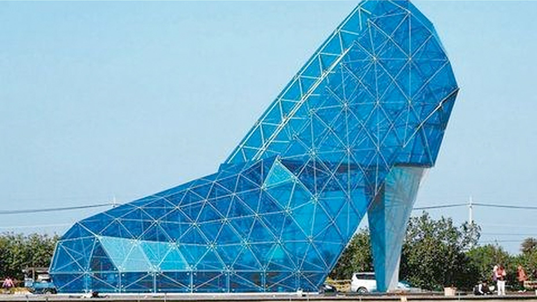 The massive, high-heeled shaped house of worship is made almost entirely out of glass.