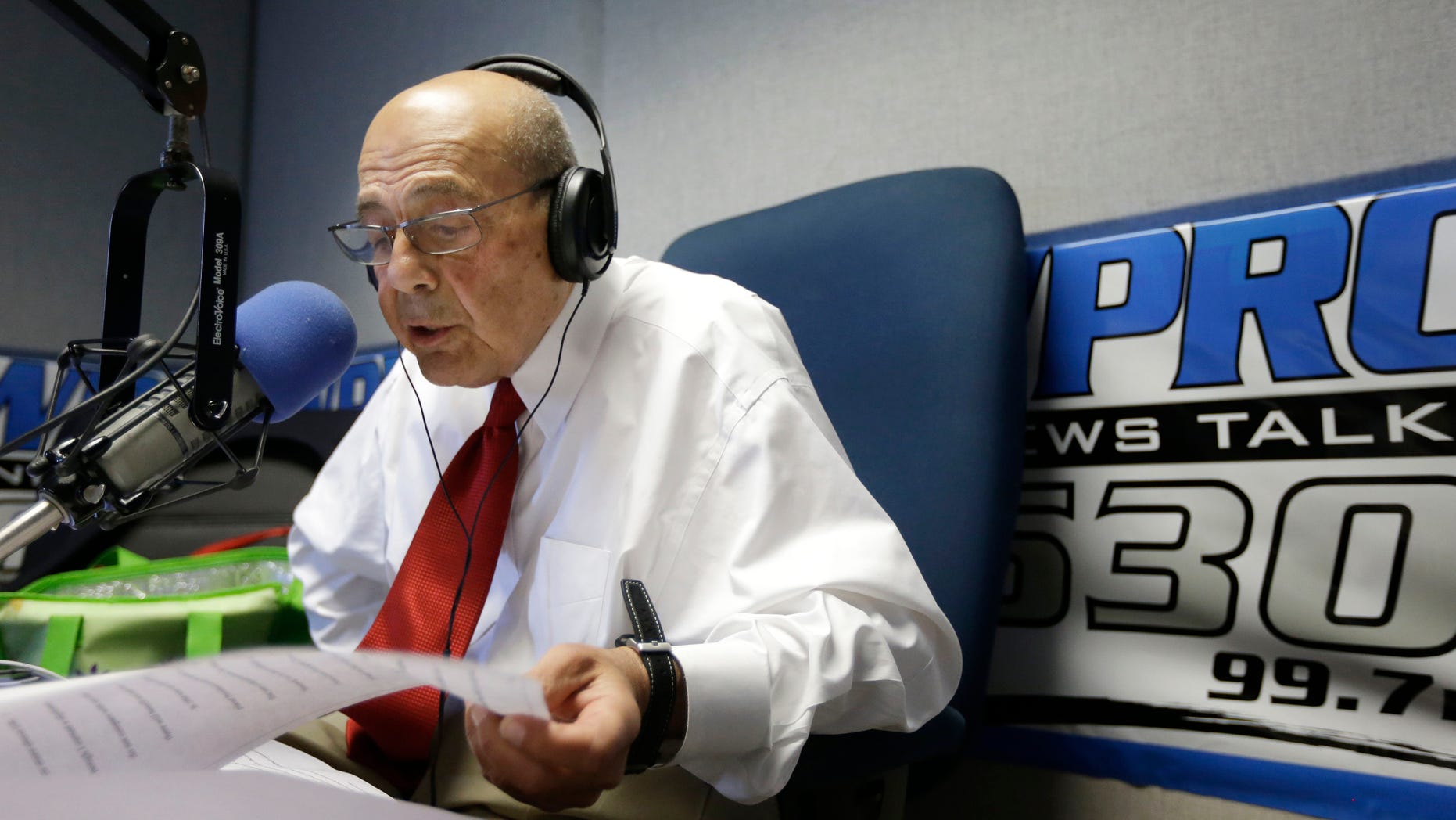 June 25, 2014: Former Providence Mayor Buddy Cianci reads a prepared statement at the WPRO-AM radio station in East Providence, R.I.