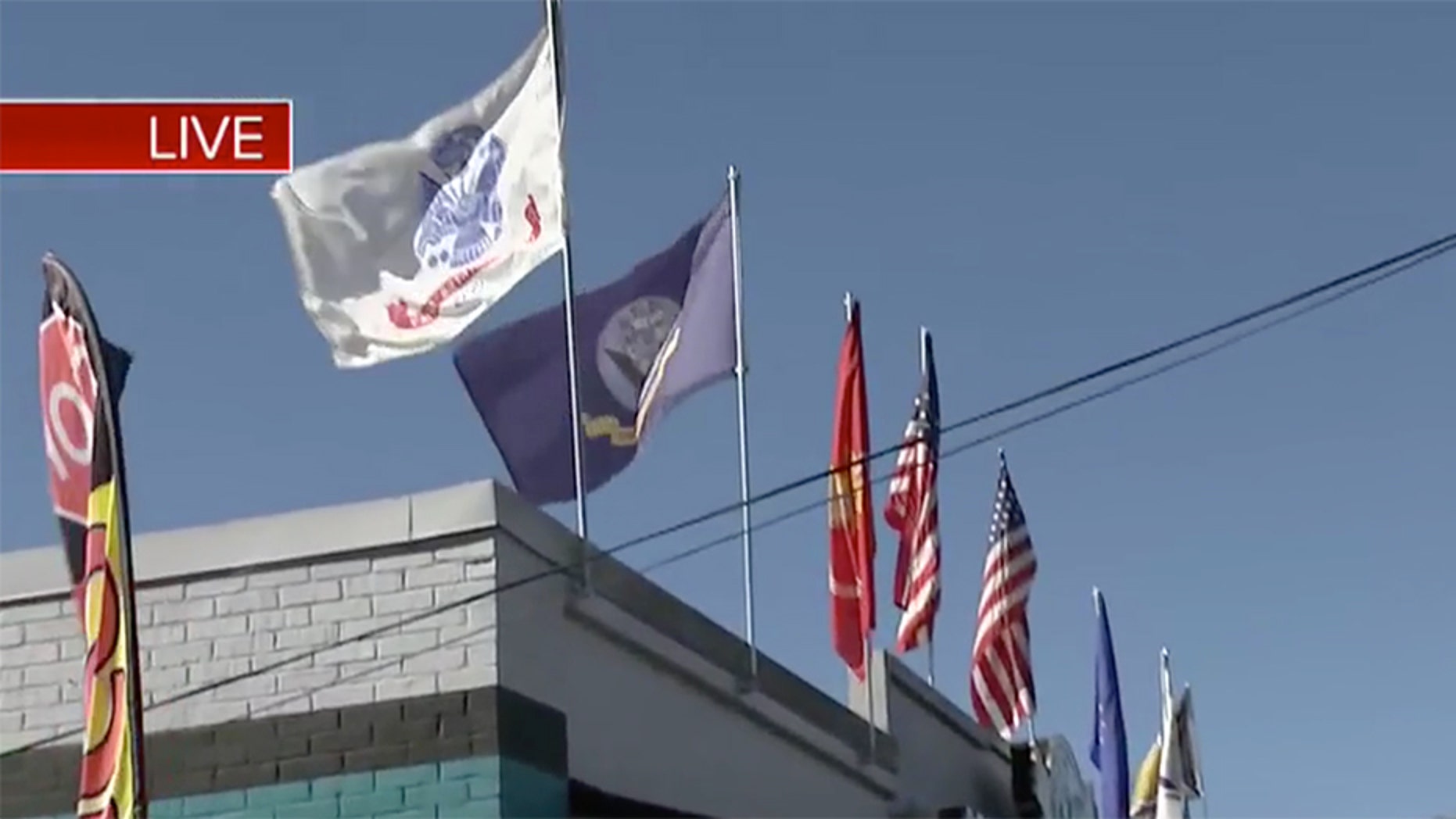 Jaguar Power Sports in Jacksonville, Fla., was cited Monday for flying military flags.
