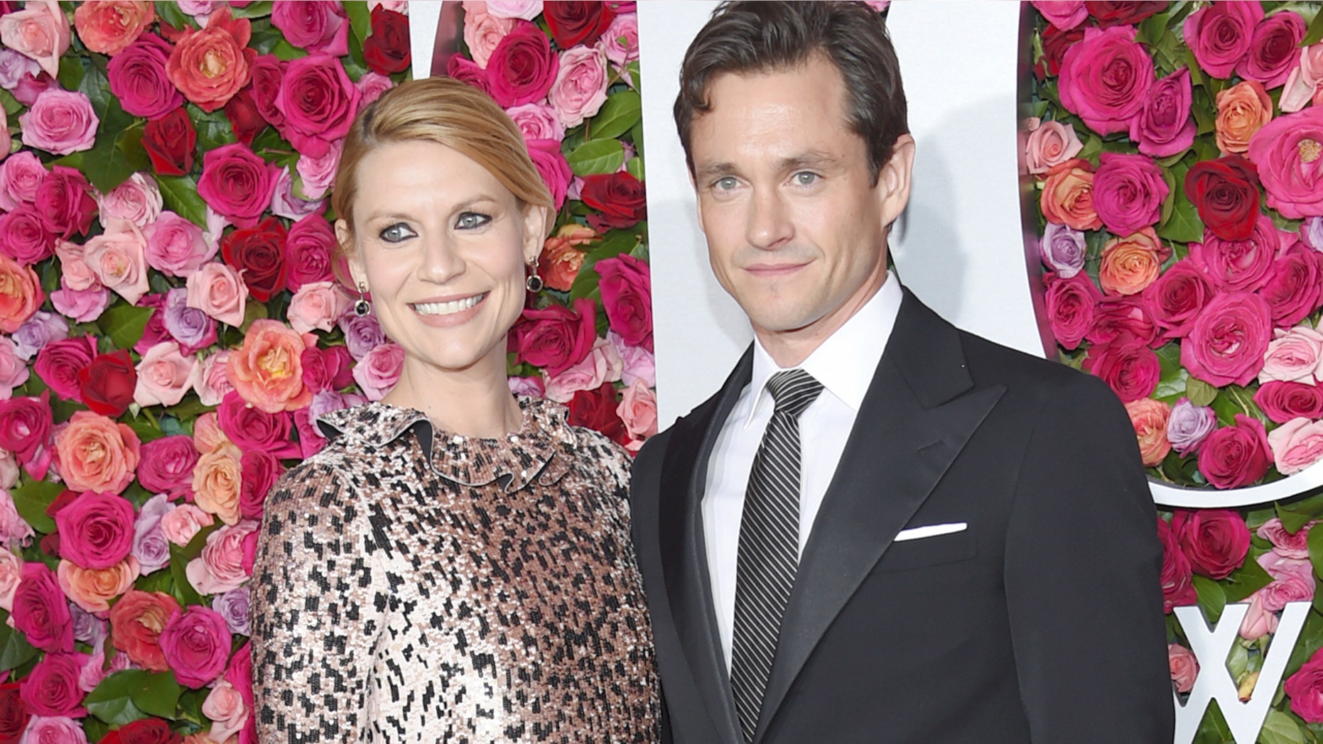 FILE - In this June 10, 2018 file photo, Claire Danes, left, and Hugh Dancy arrive at the 72nd annual Tony Awards in New York. A publicist for the actors said Friday, Aug. 31, that the couple gave birth Monday in New York. (Photo by Evan Agostini/Invision/AP, File)
