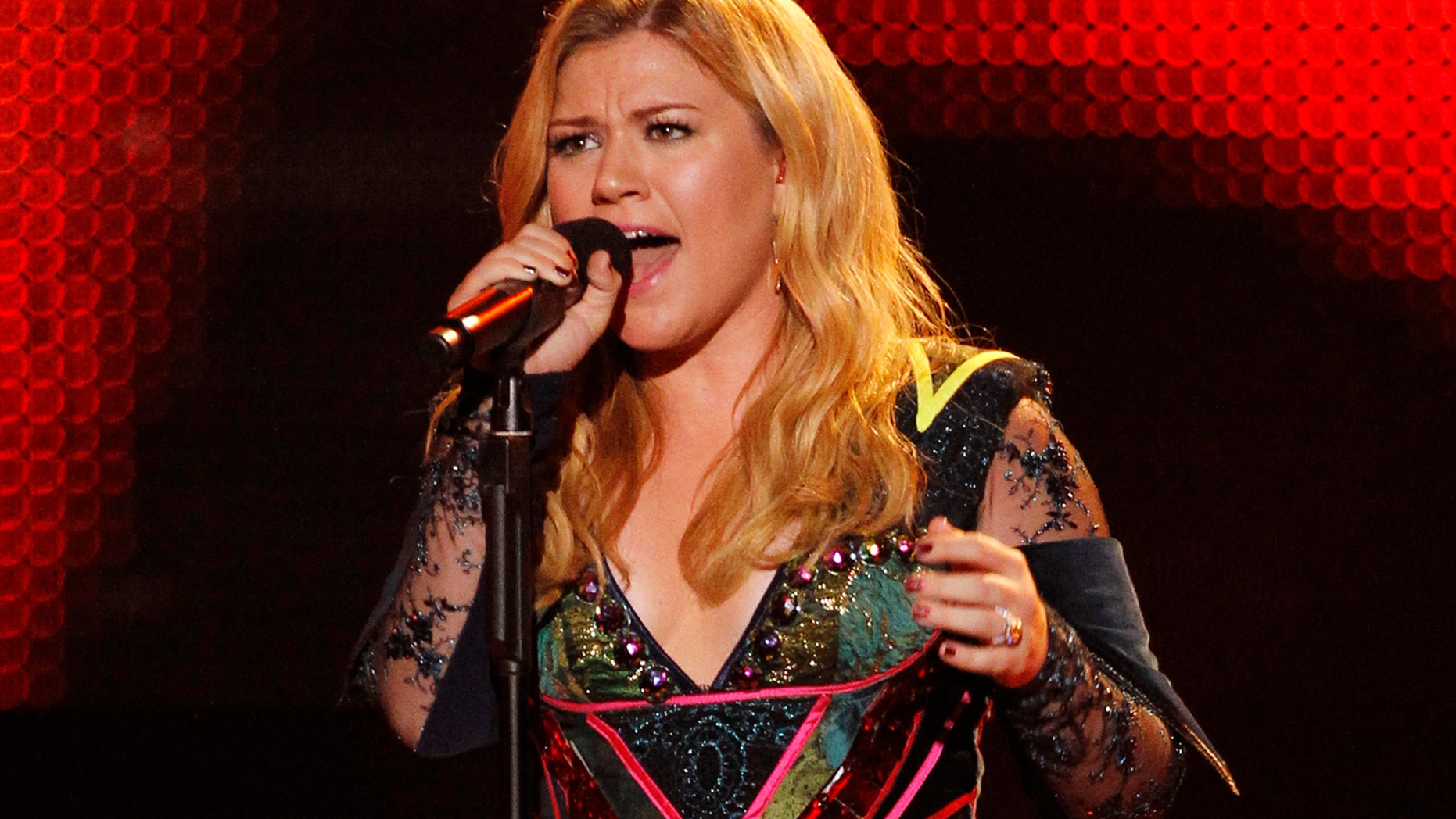 December 16, 2012. Kelly Clarkson performs at the VH1 Divas 2012 show in Los Angeles.