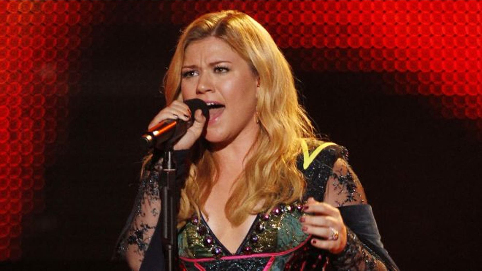 FILE: Dec.16, 2012: Kelly Clarkson performs during the VH1 Divas show in Los Angeles.