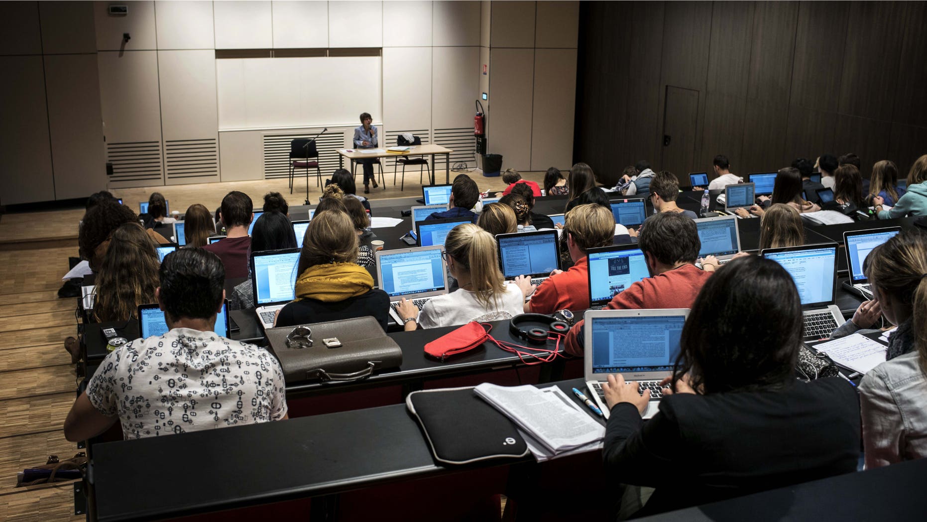 Students of the Catholic University of Lyon use laptops to take notes in a classroom, on September 18, 2015 in Lyon, eastern France. AFP PHOTO / JEFF PACHOUD (Photo credit should read JEFF PACHOUD/AFP/Getty Images)