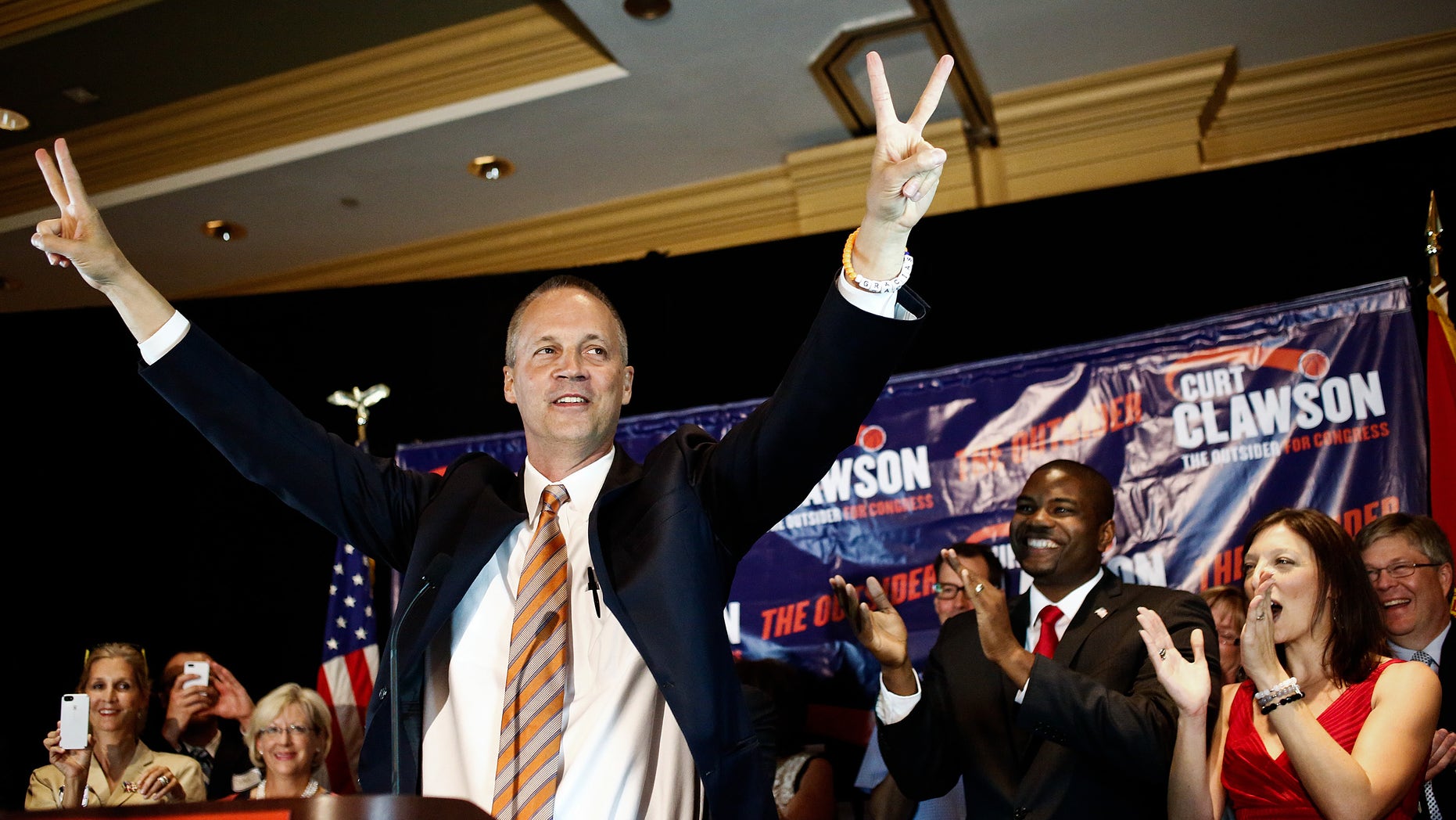 April 22, 2014: Curt Clawson celebrates along with a cheering crowd at his election party at the Hyatt Regency Coconut Point in Bonita Springs, Fla.