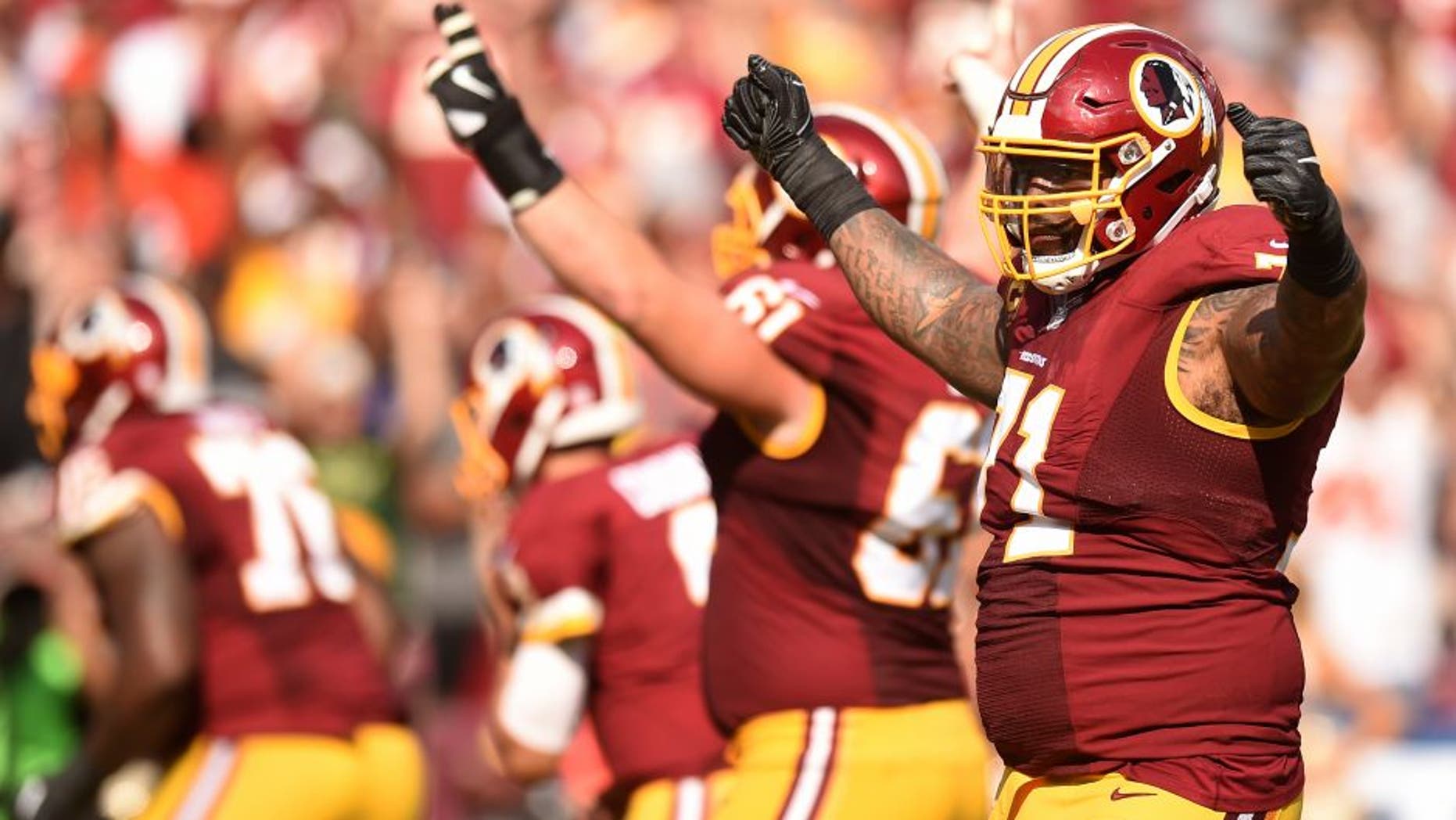LANDOVER, MD - OCTOBER 2: Tackle Trent Williams #71 of the Washington Redskins acknowledges the crowd in the fourth inning against the Cleveland Browns at FedExField on October 2, 2016 in Landover, Maryland. (Photo by Mitchell Layton/Getty Images)