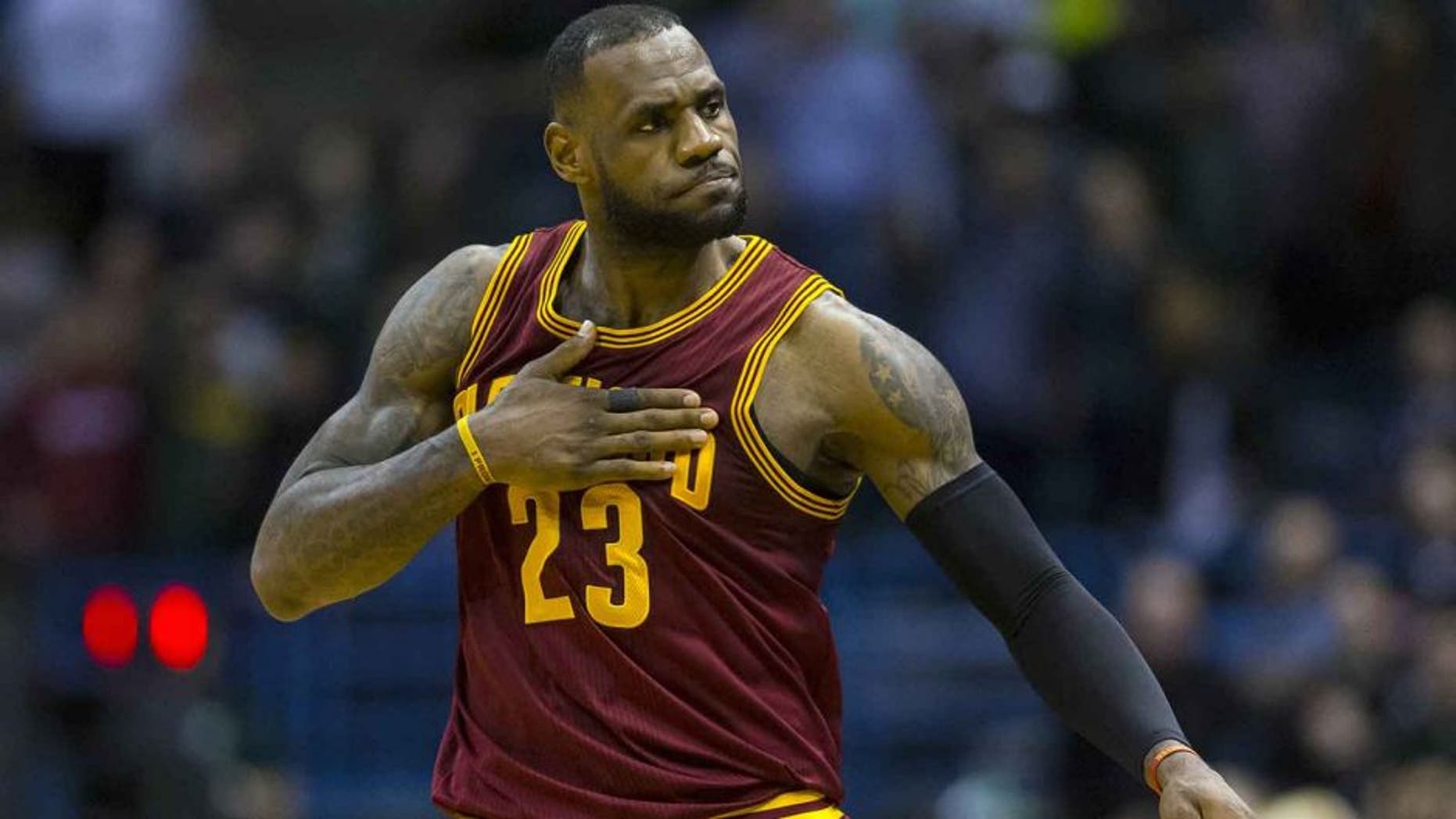 Apr 8, 2015; Milwaukee, WI, USA; Cleveland Cavaliers forward LeBron James (23) reacts after making a basket during the fourth quarter against the Milwaukee Bucks at BMO Harris Bradley Center. Cleveland won 104-99. Mandatory Credit: Jeff Hanisch-USA TODAY Sports