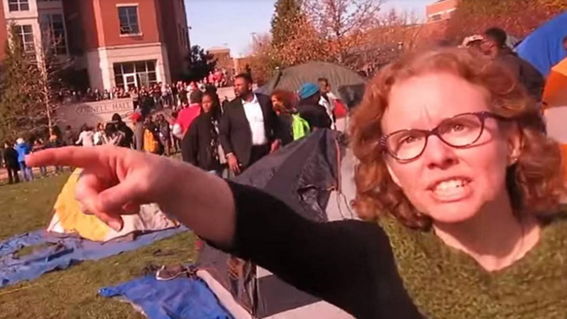 Professor Melissa Click was caught on video trying to throw a reporter off of public property. (Screengrab)