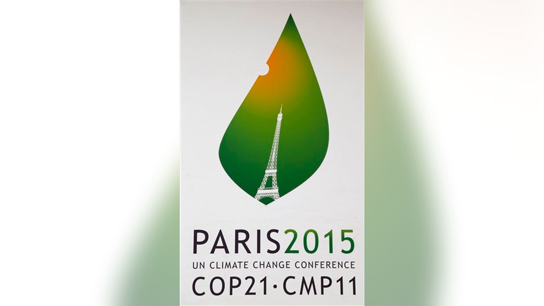 The logo of the COP21 is pictured on a banner outside the French Foreign Ministry in Paris promoting the Climate conference. The Paris conference, known as COP21, runs Nov. 30-Dec 11. (AP Photo/Jacques Brinon)