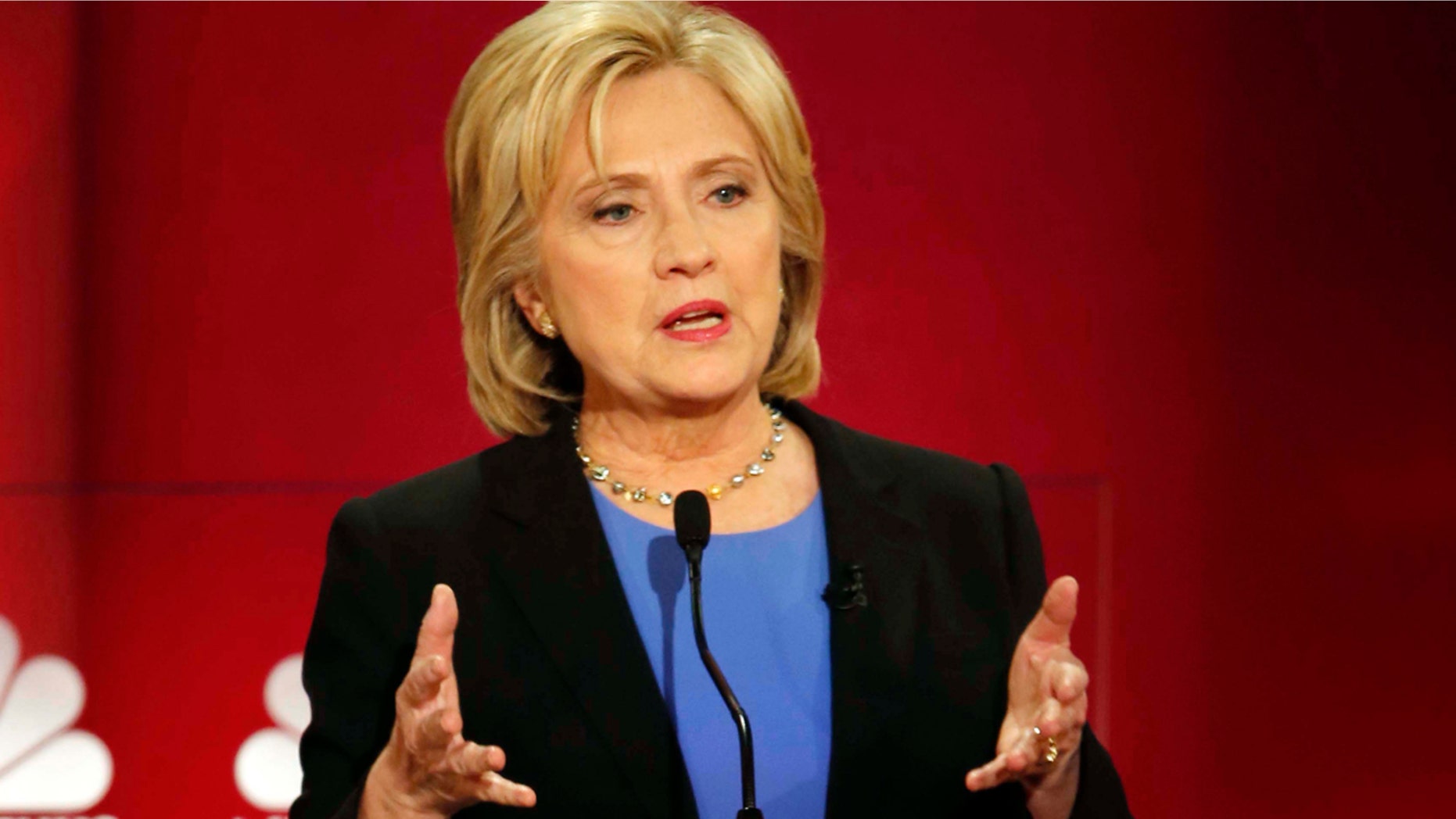 Democratic presidential candidate, Hillary Clinton speaks at the NBC, YouTube Democratic presidential debate at the Gaillard Center, Sunday, Jan. 17, 2016, in Charleston, S.C. (AP Photo/Mic Smith)