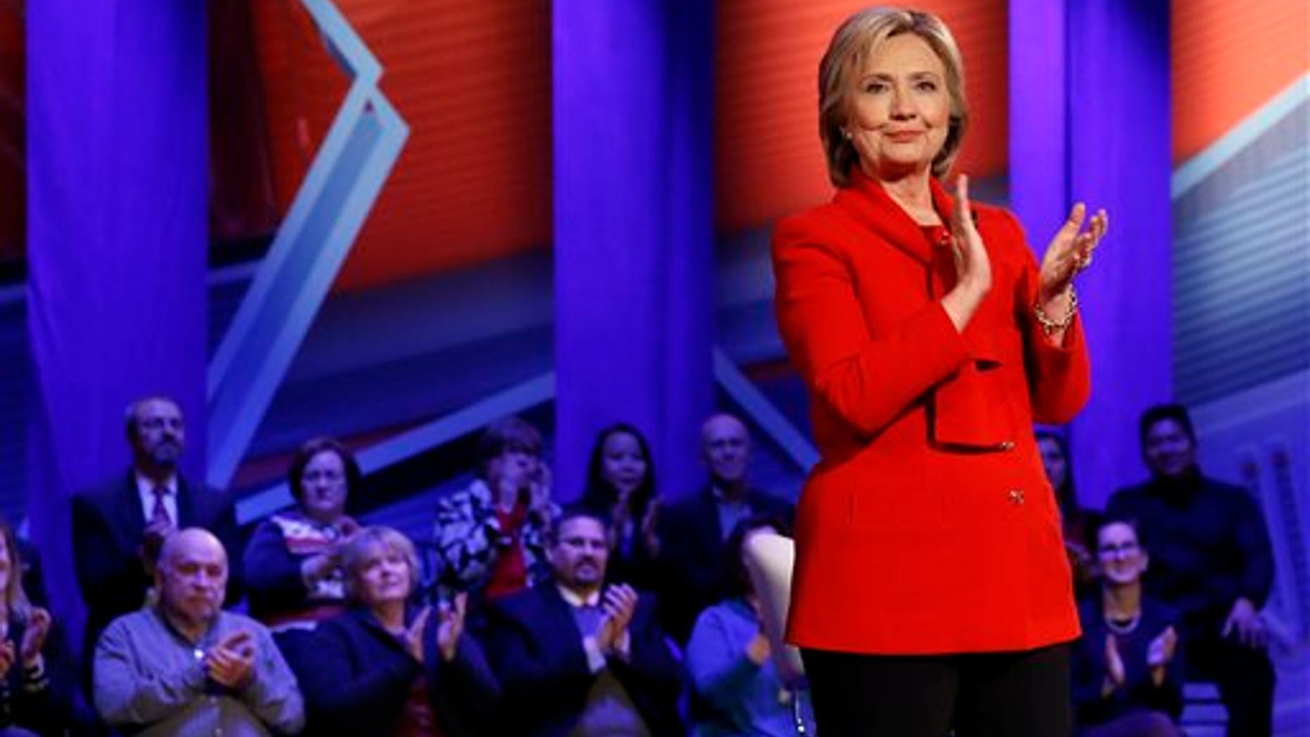 Democratic presidential candidate Hillary Clinton applauds after a CNN town hall at Drake University in Des Moines, Iowa, Monday, Jan. 25, 2016. (AP Photo/Patrick Semansky)