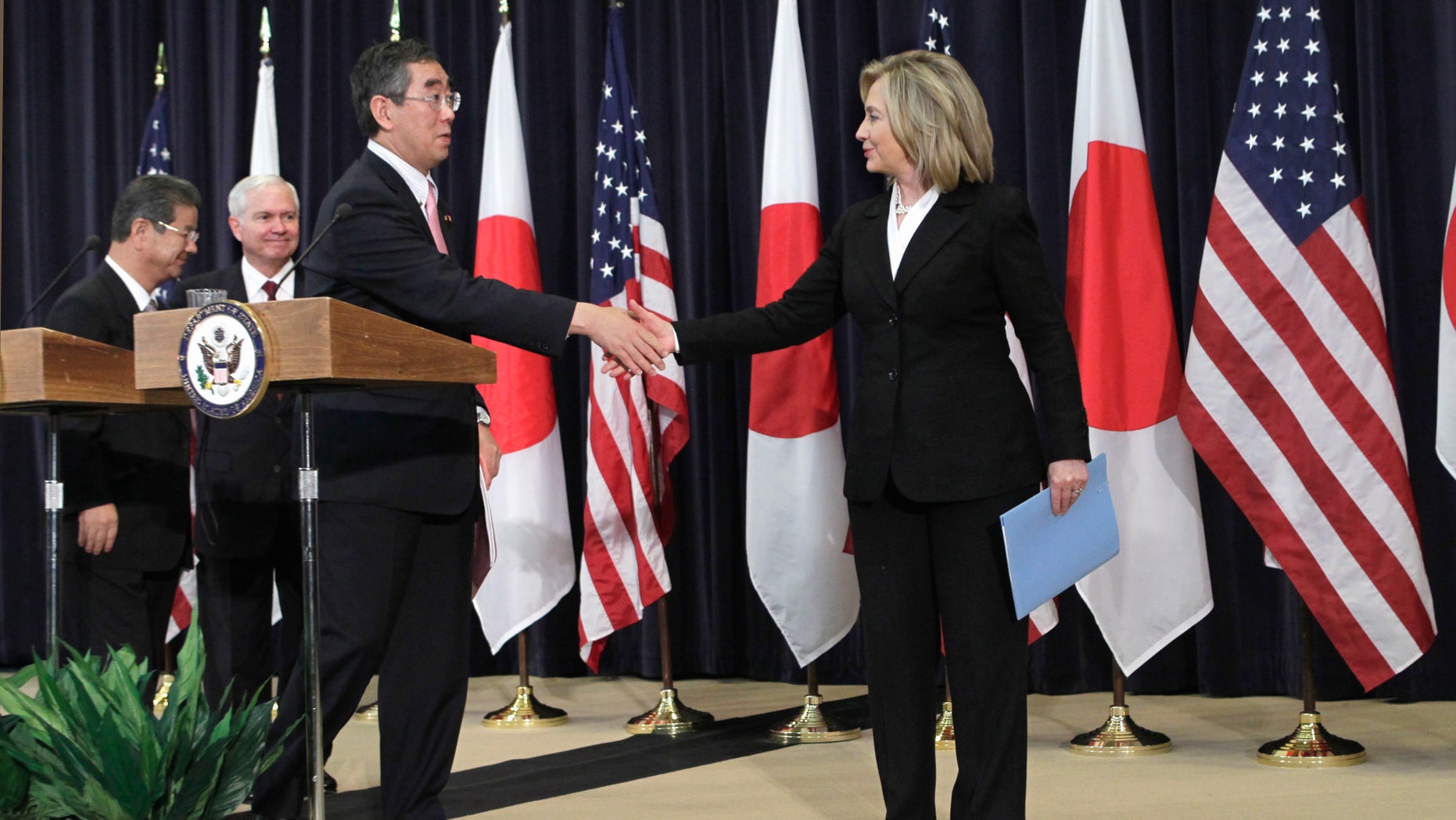 Tuesday: Secretary of State Hillary Rodham Clinton shakes hands with Japanese Foreign Minister Takeaki Matsumoto at a news conference at the State Department.