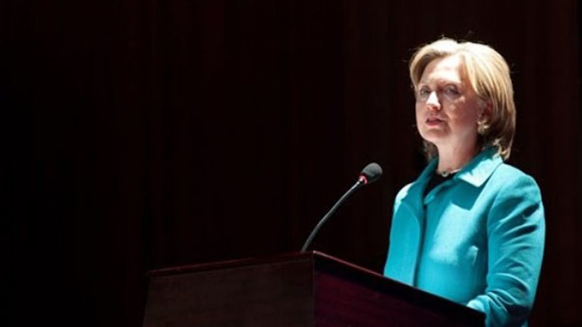 Secretary of State Hillary Clinton speaks before signing an agreement at the National Center for the Performing Arts in Beijing May 25. (AP Photo)